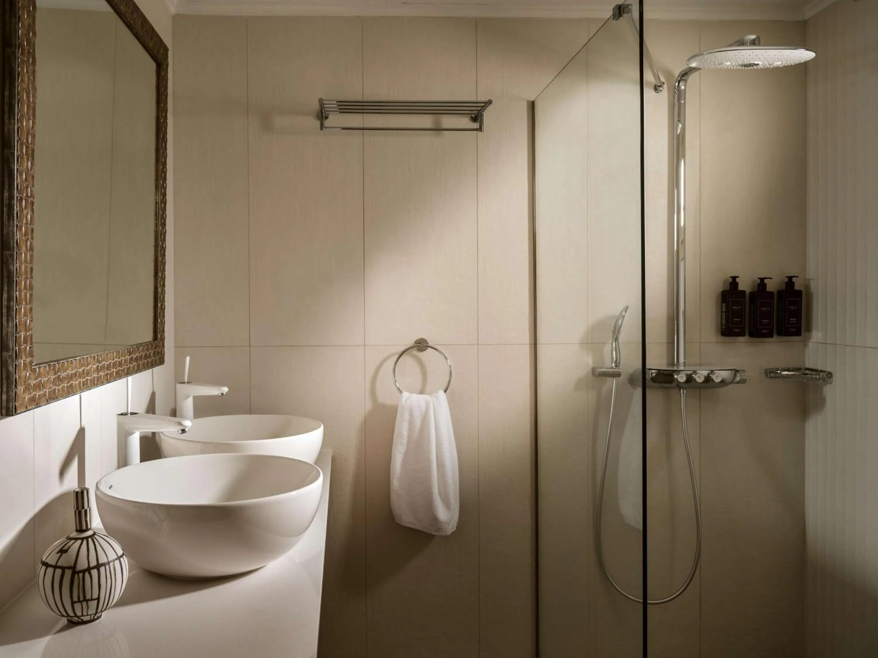 Bathroom in Sea Breeze Santorini Beach Resort, Curio By Hilton