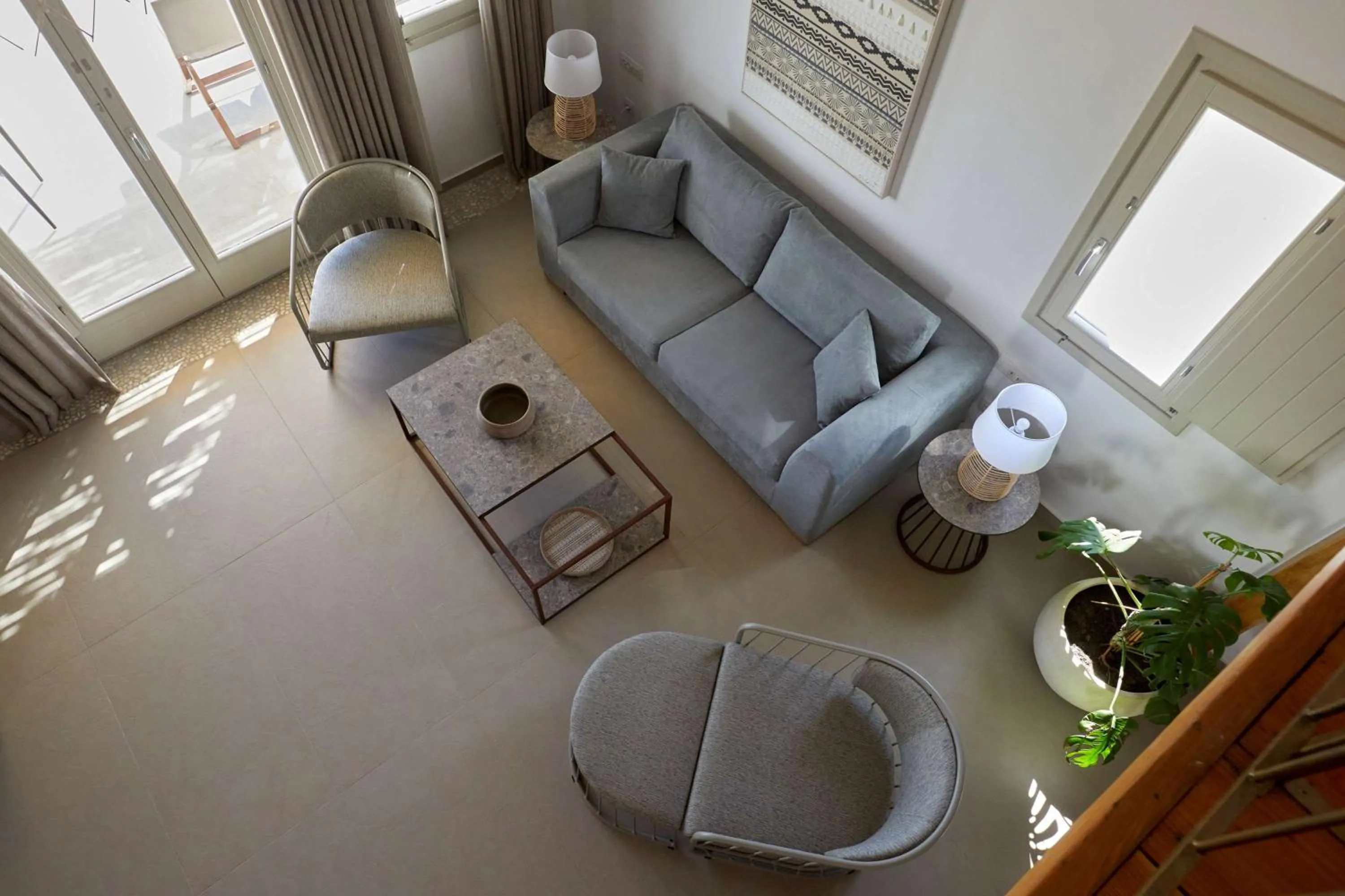 Living room in Sea Breeze Santorini Beach Resort, Curio By Hilton