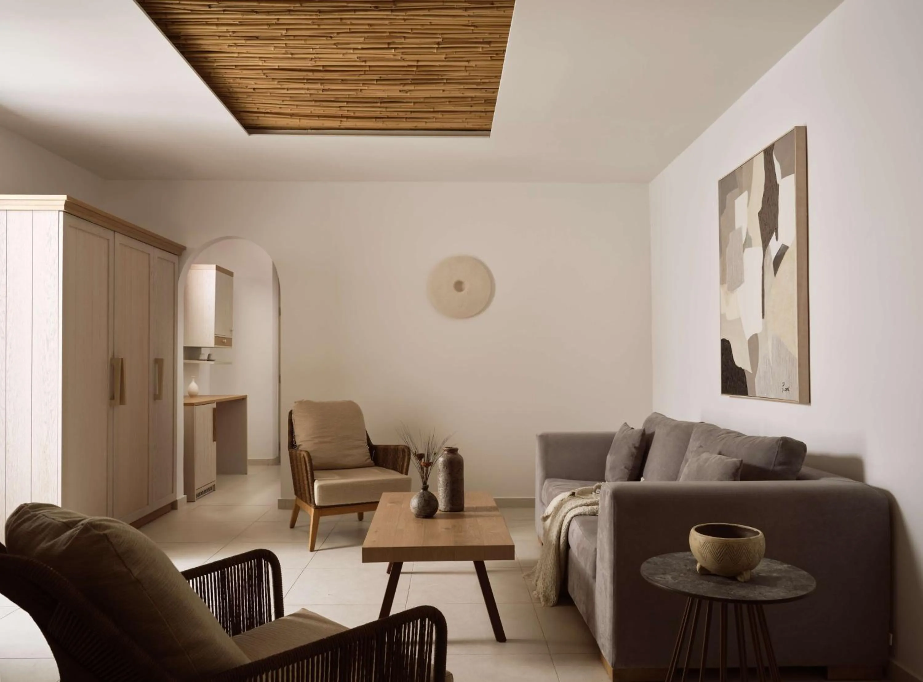 Living room in Sea Breeze Santorini Beach Resort, Curio By Hilton