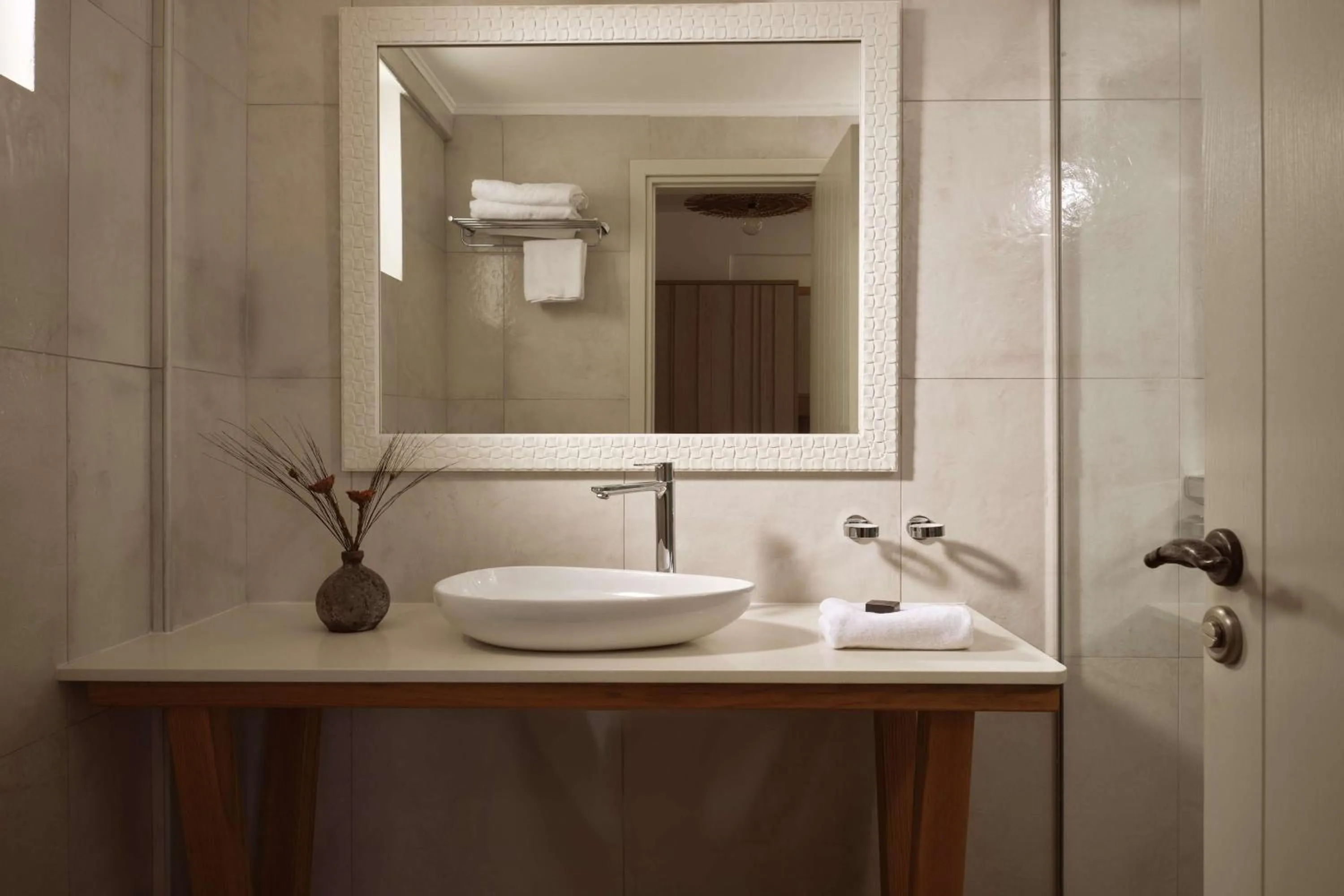 Bathroom in Sea Breeze Santorini Beach Resort, Curio By Hilton