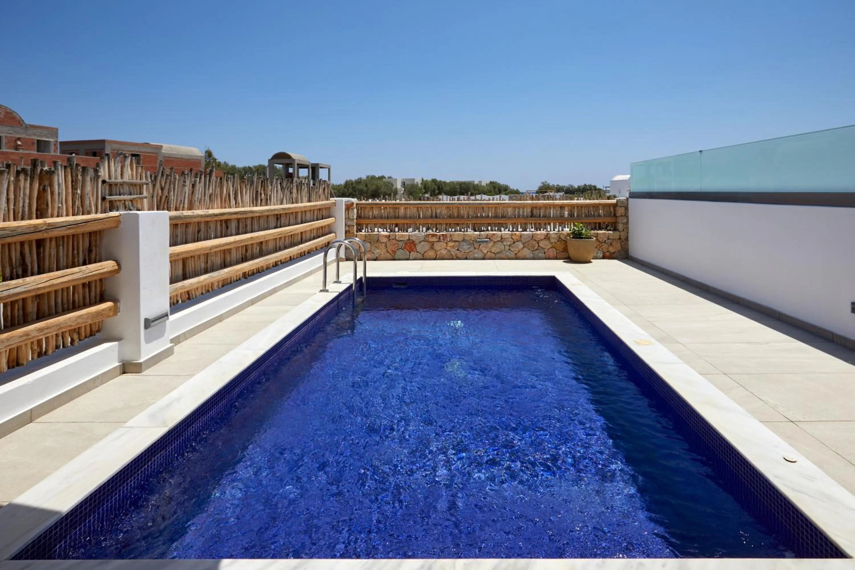 Balcony/Terrace in Sea Breeze Santorini Beach Resort, Curio By Hilton