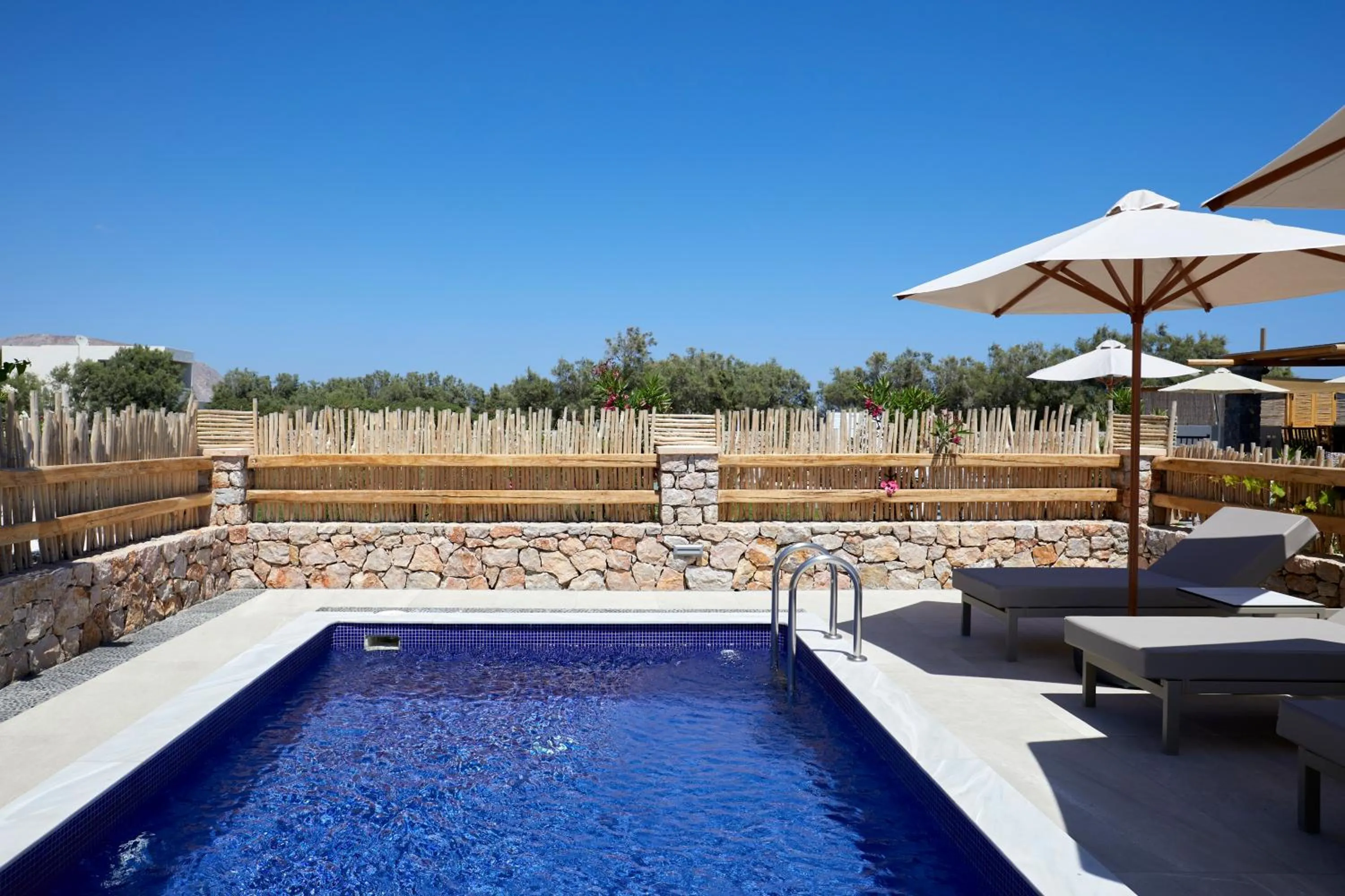 Balcony/Terrace in Sea Breeze Santorini Beach Resort, Curio By Hilton