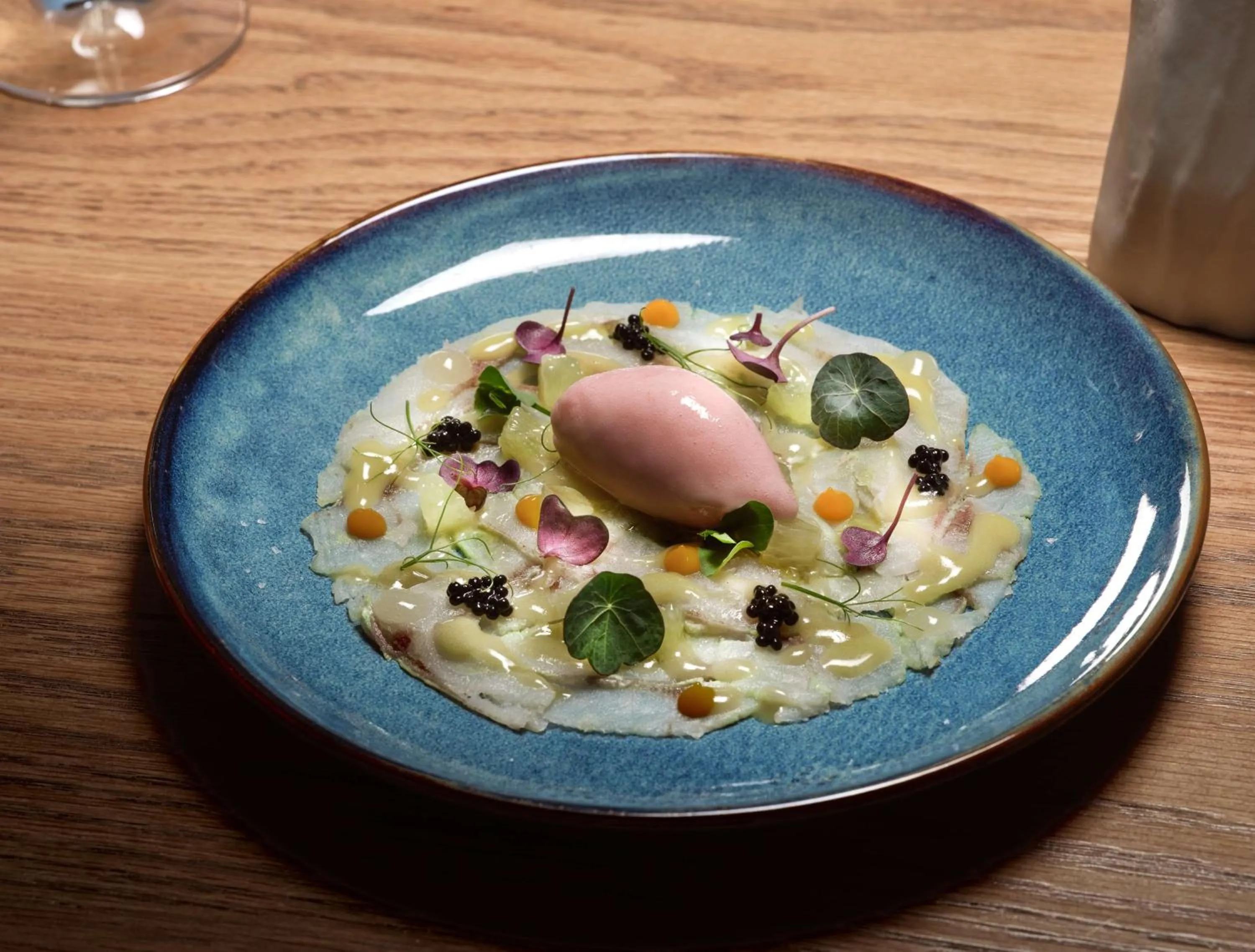 Dining area in Sea Breeze Santorini Beach Resort, Curio By Hilton