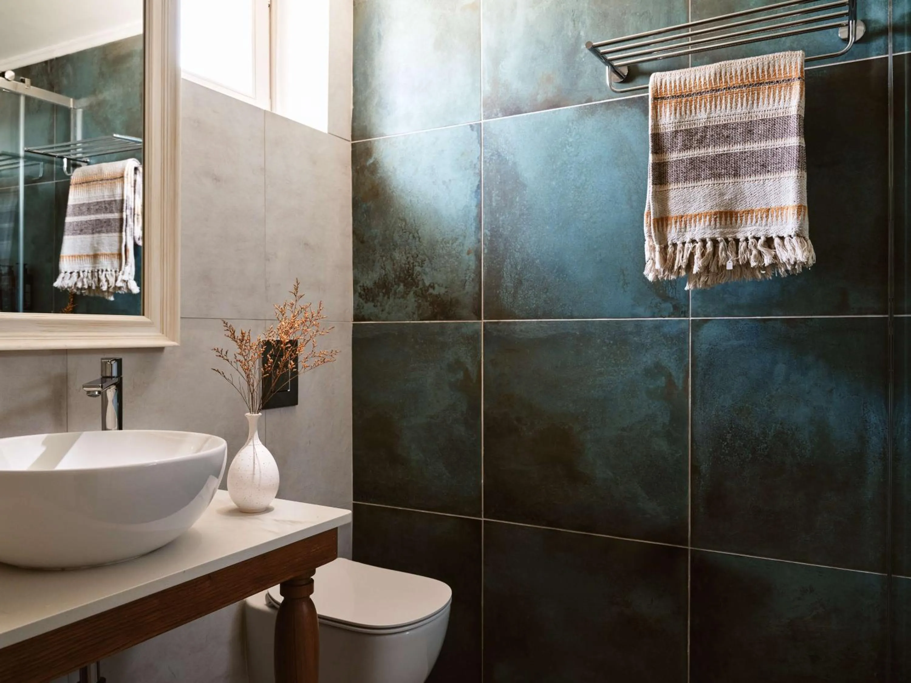 Bathroom in Sea Breeze Santorini Beach Resort, Curio By Hilton