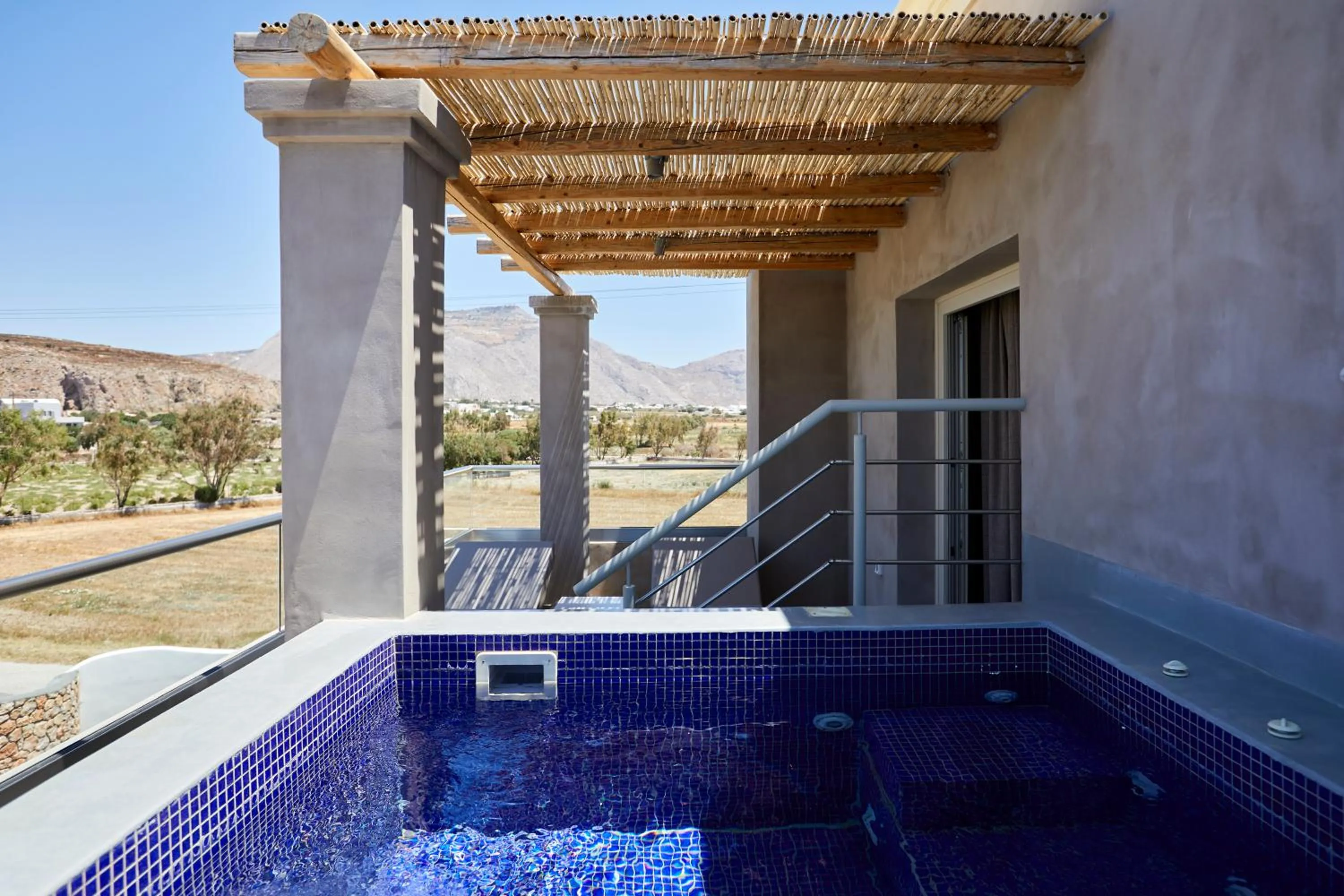 Hot Tub in Sea Breeze Santorini Beach Resort, Curio By Hilton
