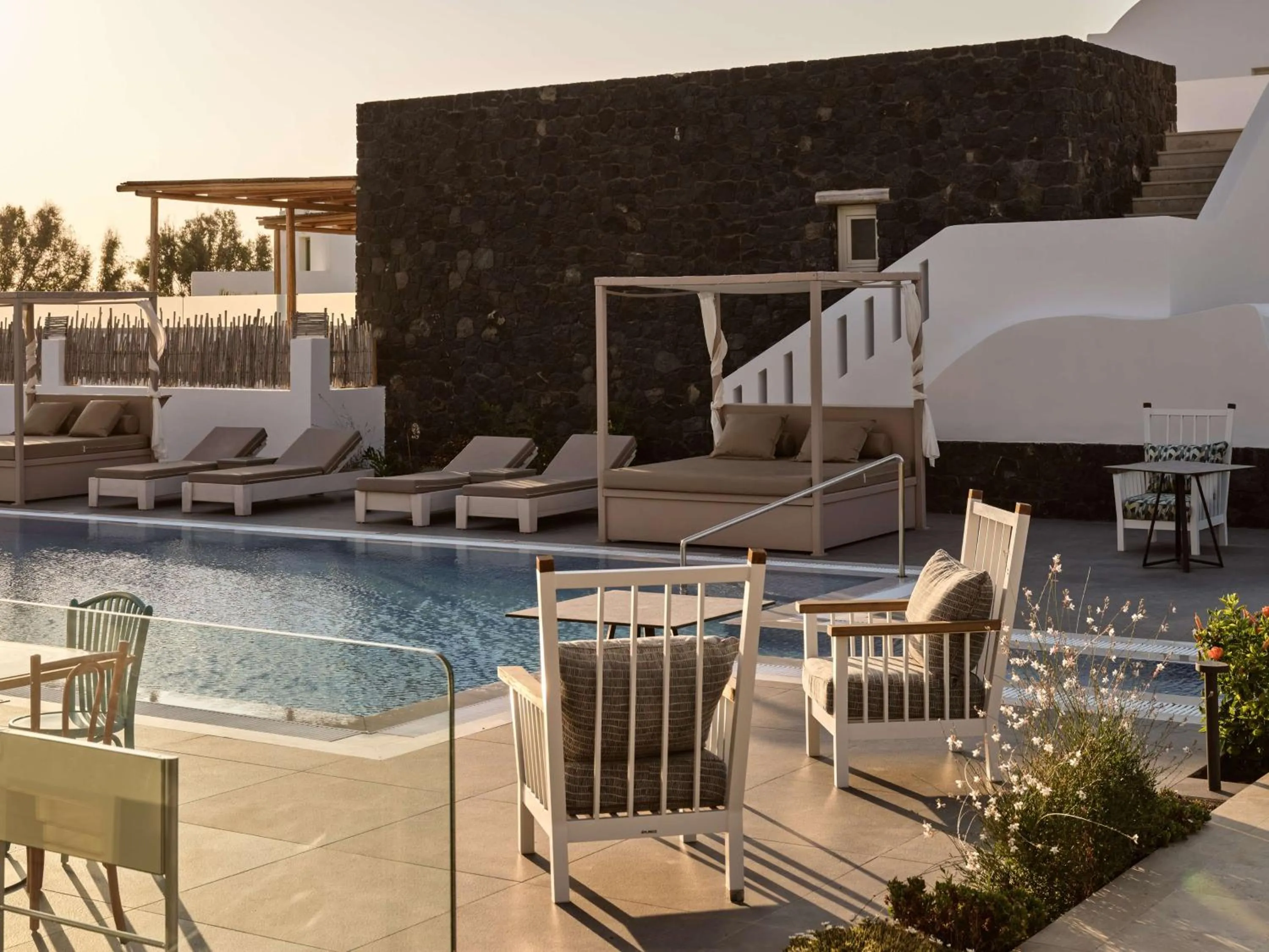 Pool view in Sea Breeze Santorini Beach Resort, Curio By Hilton
