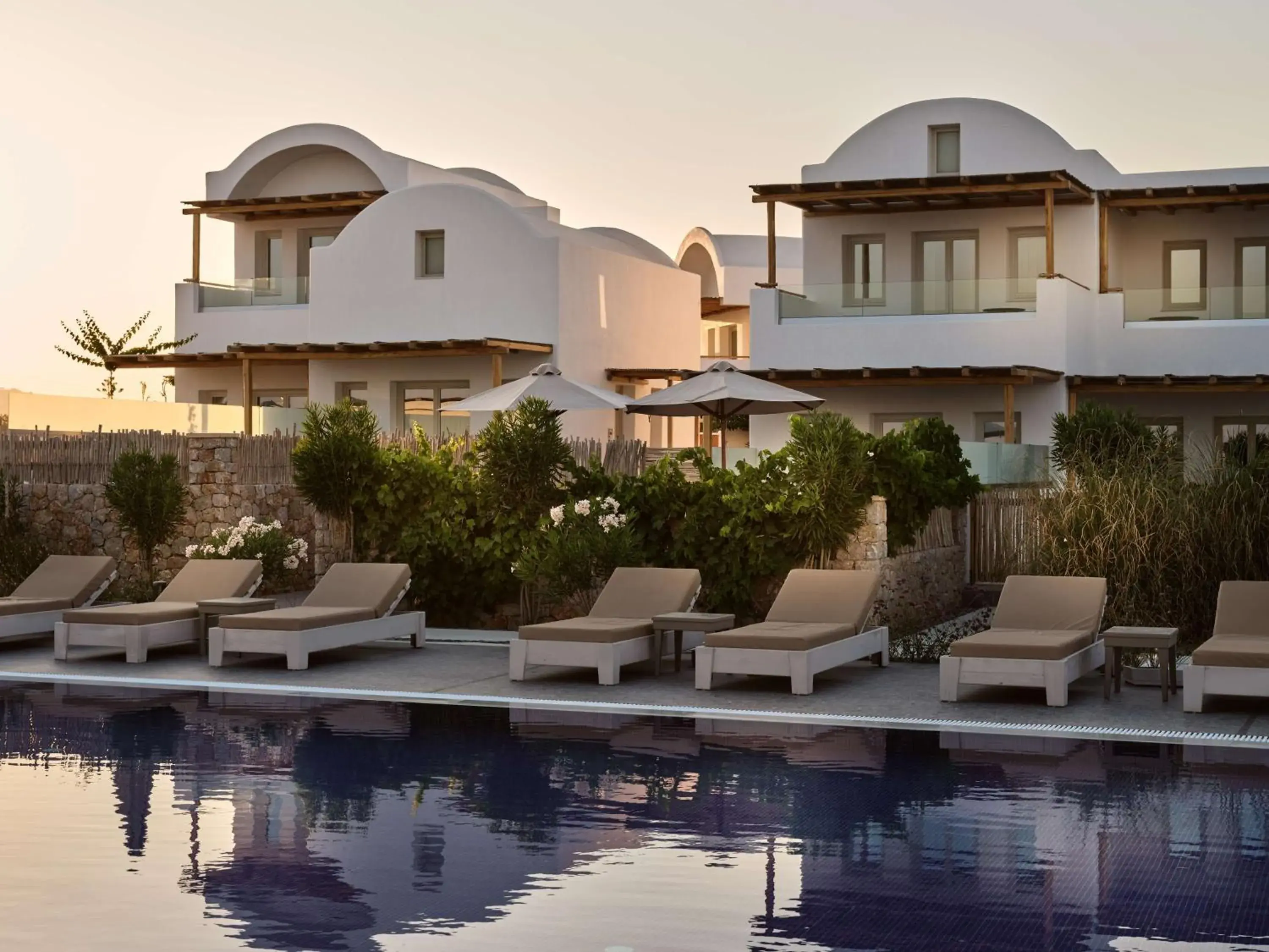 Pool view in Sea Breeze Santorini Beach Resort, Curio By Hilton Pool view in Sea Breeze Santorini Beach Resort, Curio By Hilton