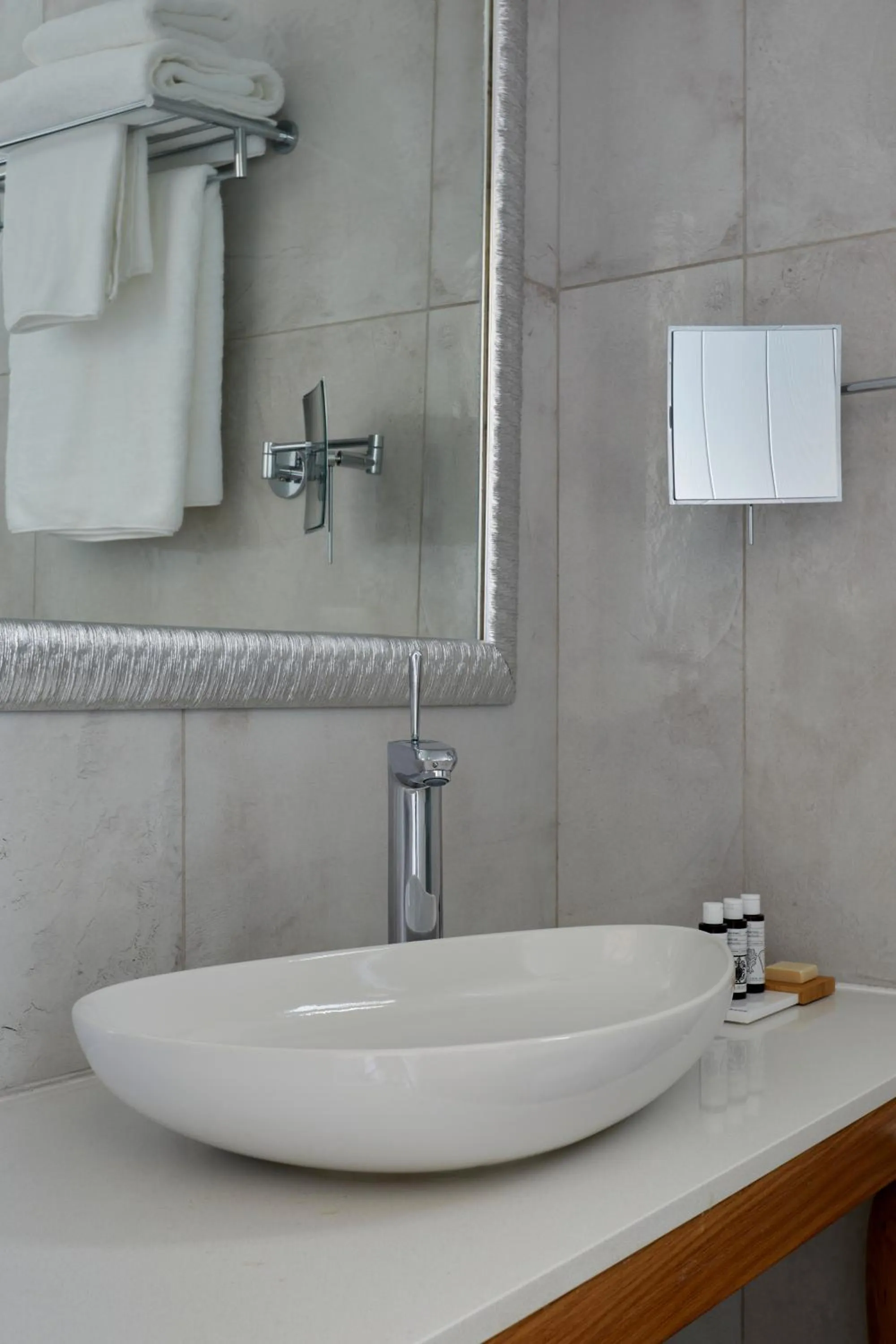 Bathroom in Sea Breeze Santorini Beach Resort, Curio By Hilton