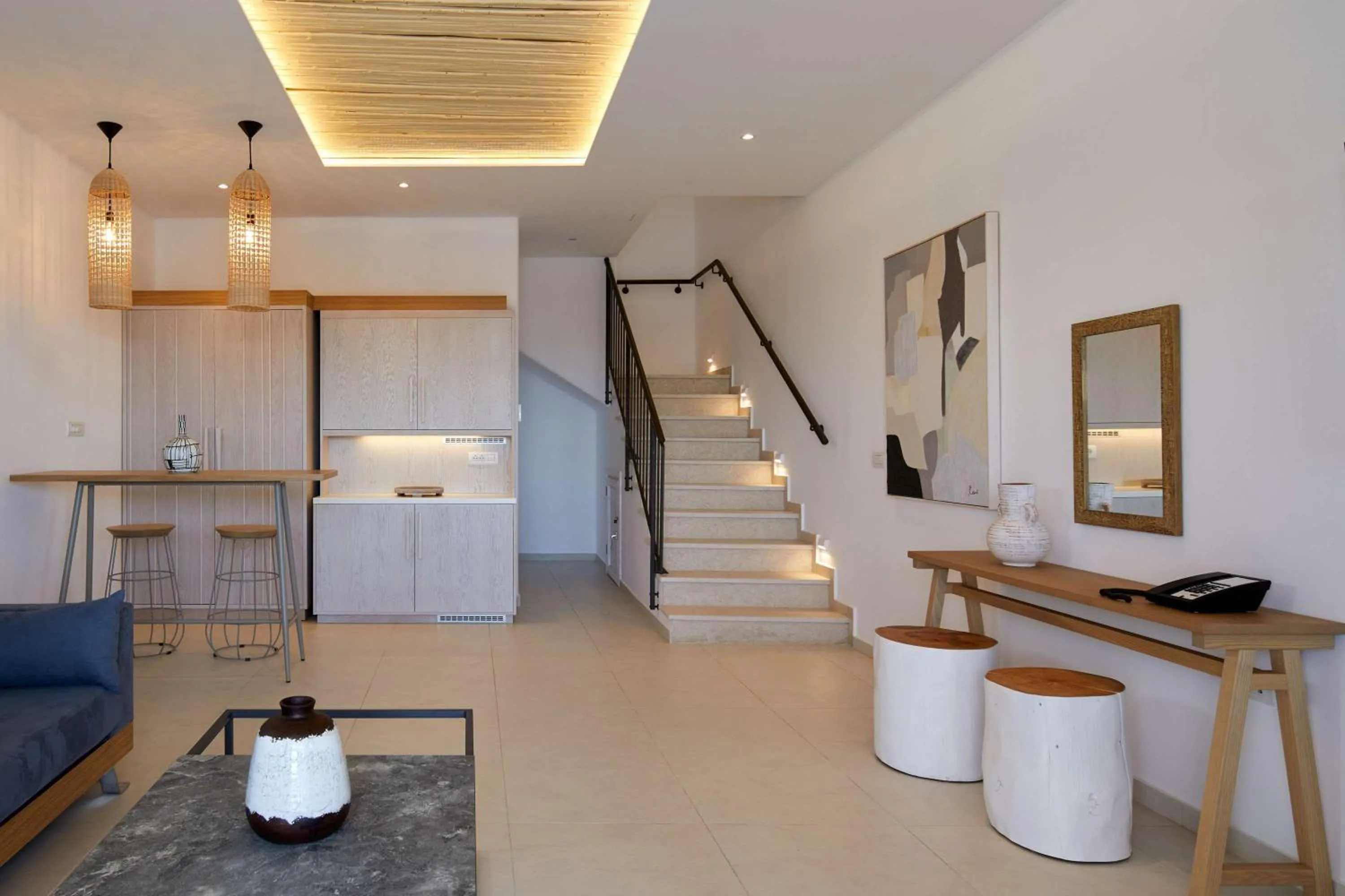 Photo of the whole room in Sea Breeze Santorini Beach Resort, Curio By Hilton