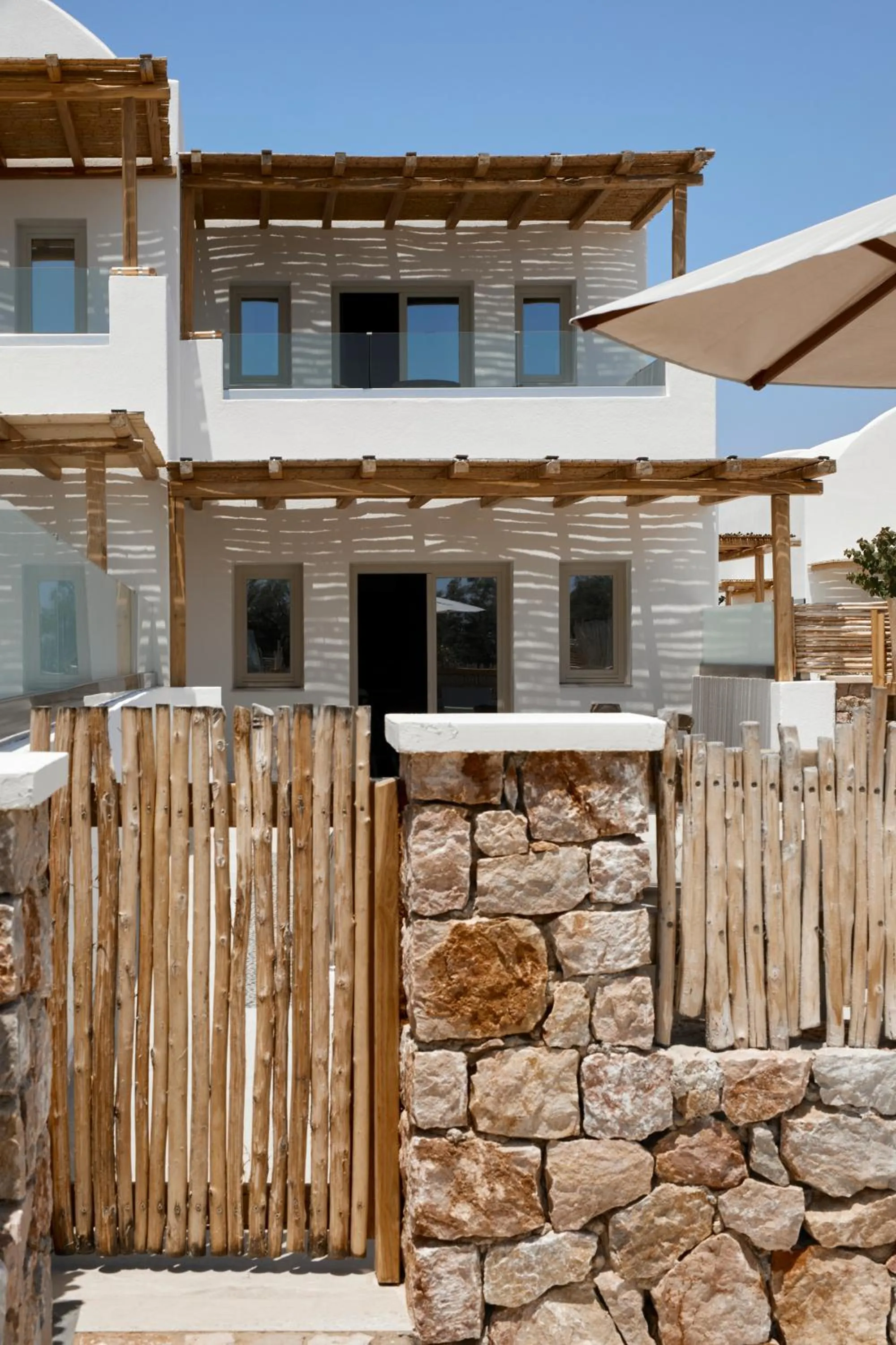 Property building in Sea Breeze Santorini Beach Resort, Curio By Hilton