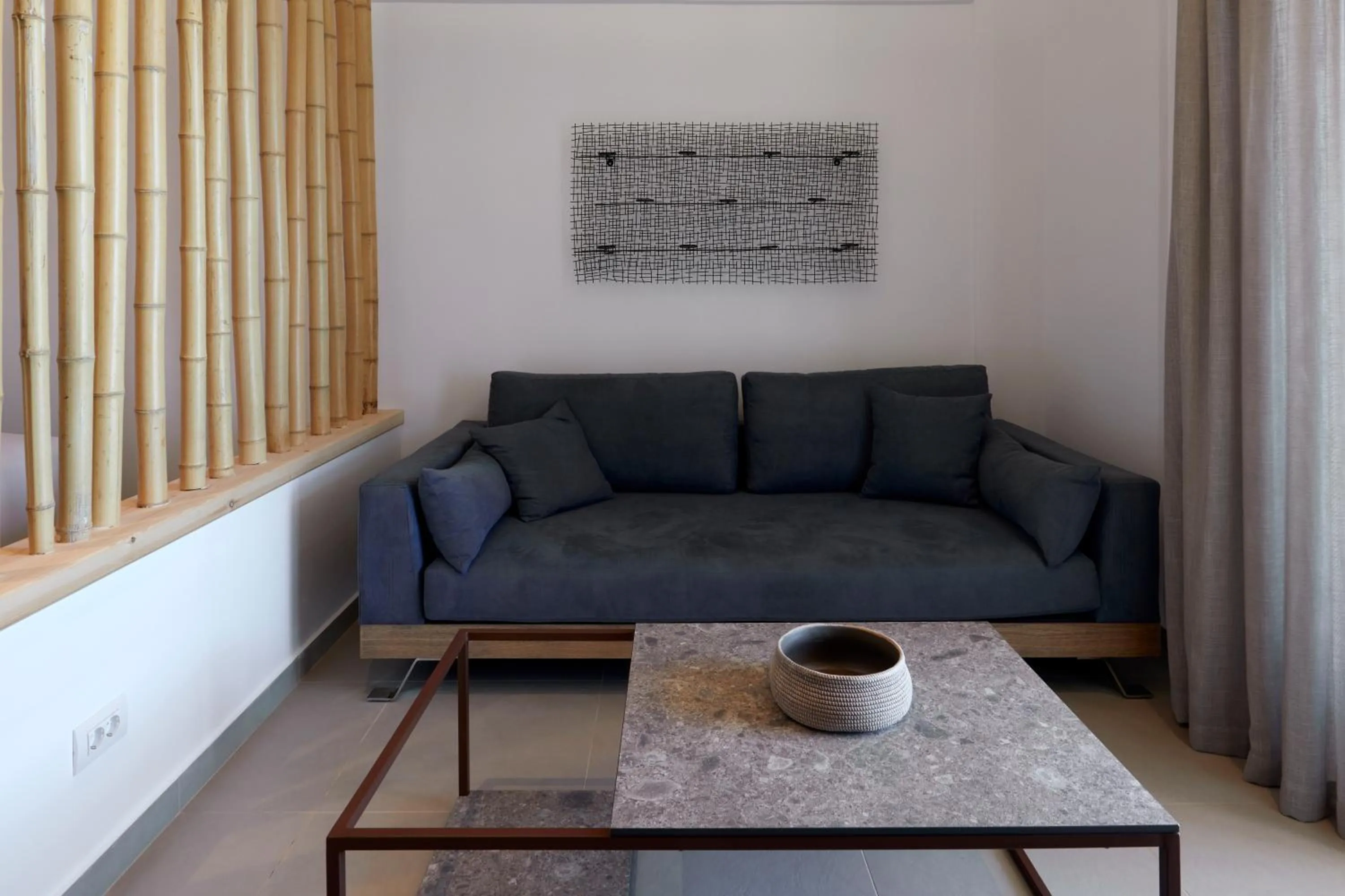 Living room in Sea Breeze Santorini Beach Resort, Curio By Hilton