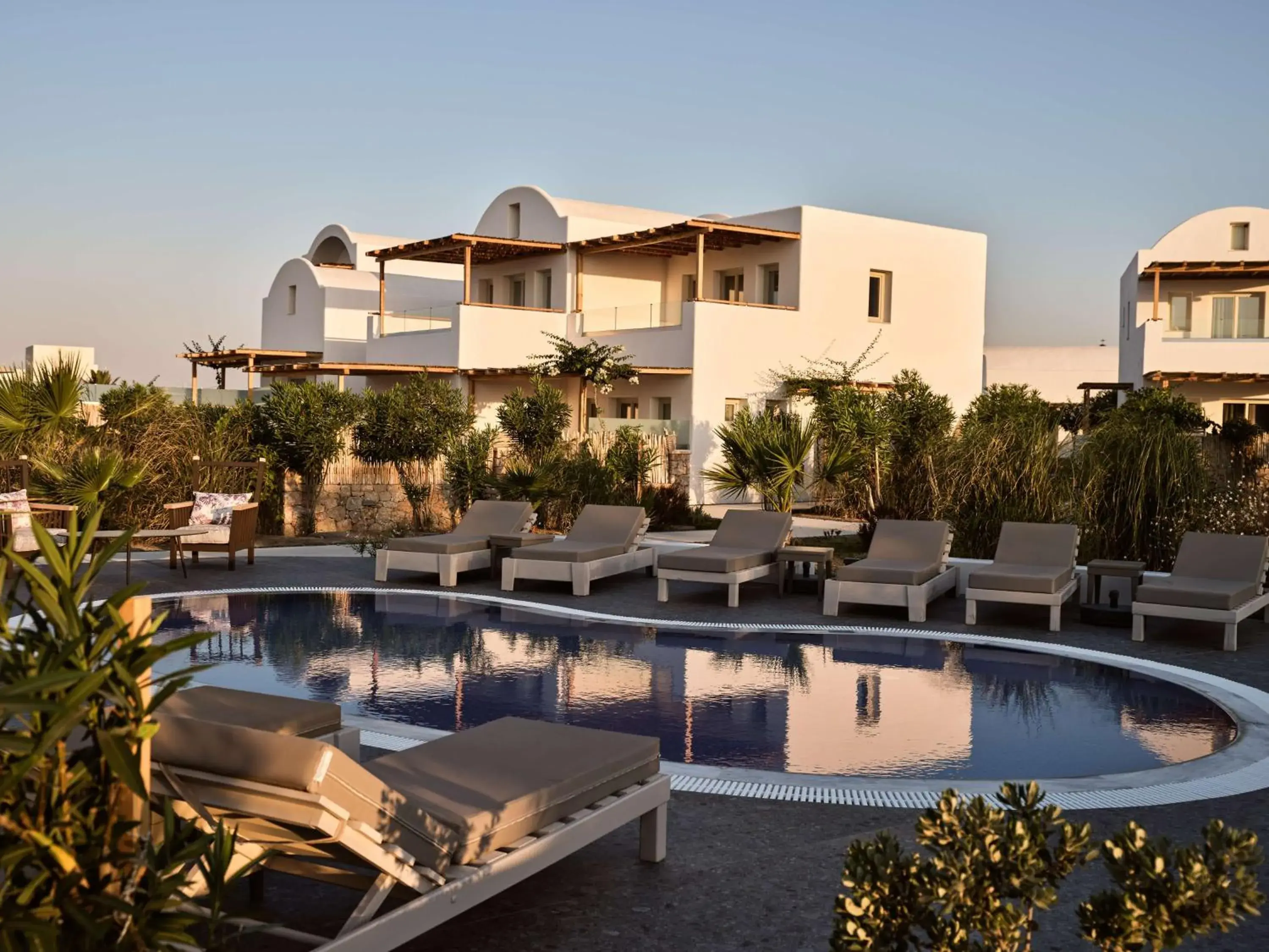 Pool view in Sea Breeze Santorini Beach Resort, Curio By Hilton Pool view in Sea Breeze Santorini Beach Resort, Curio By Hilton