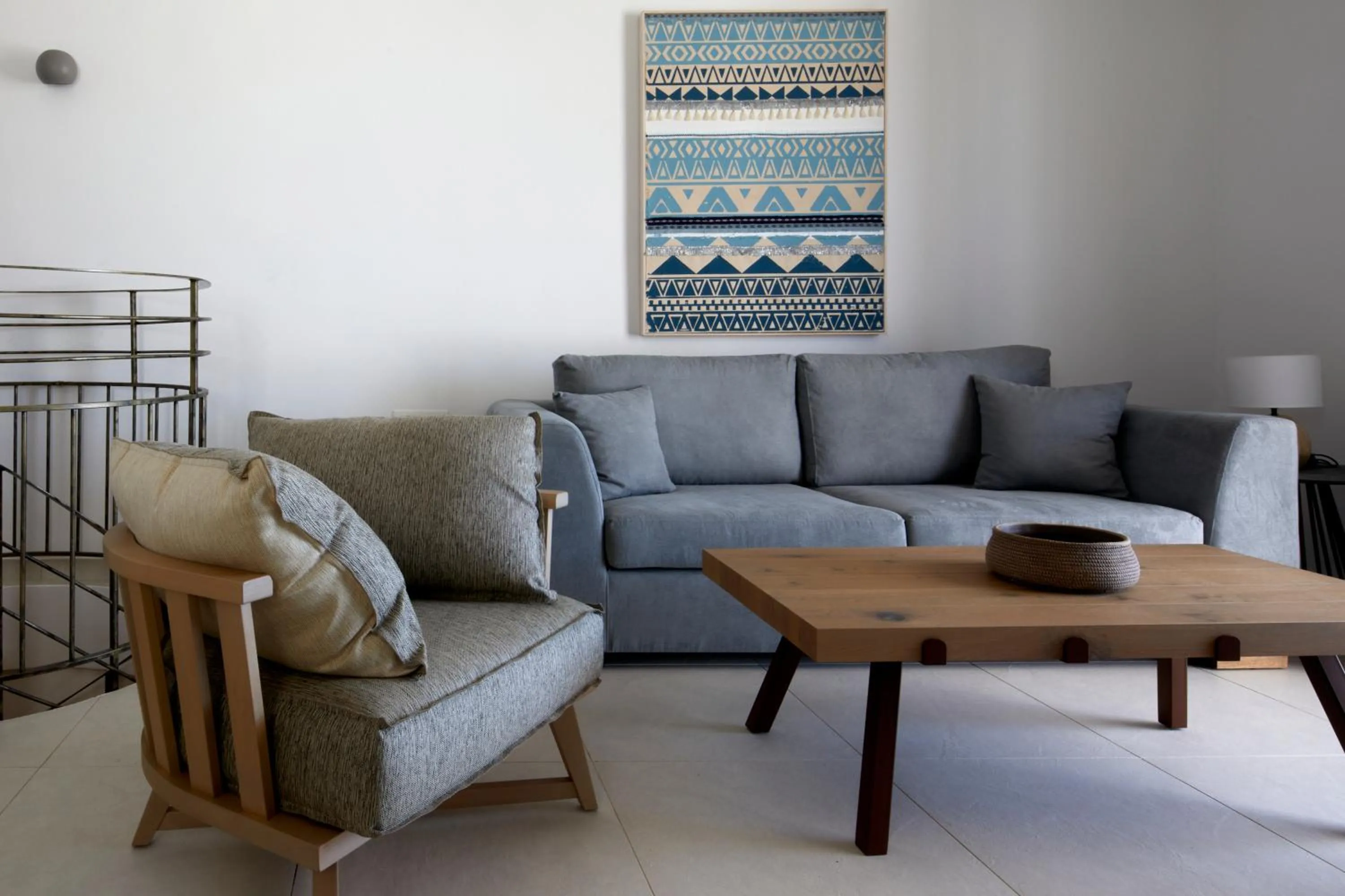 Living room in Sea Breeze Santorini Beach Resort, Curio By Hilton
