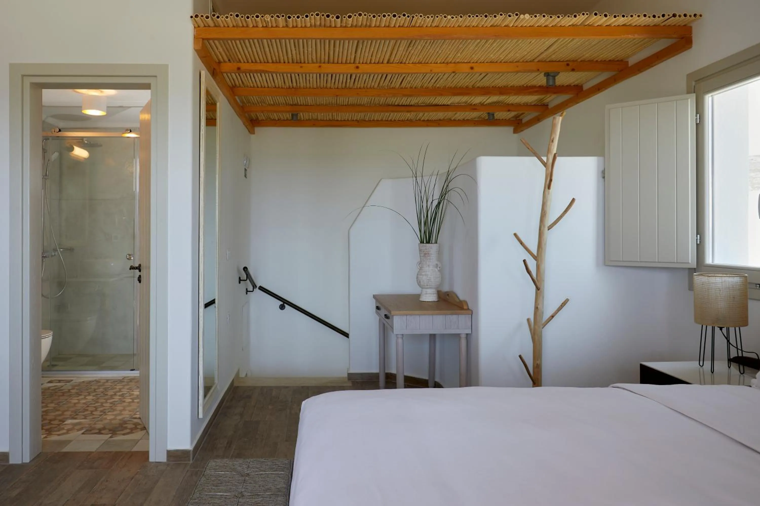 Shower, Bed in Sea Breeze Santorini Beach Resort, Curio By Hilton