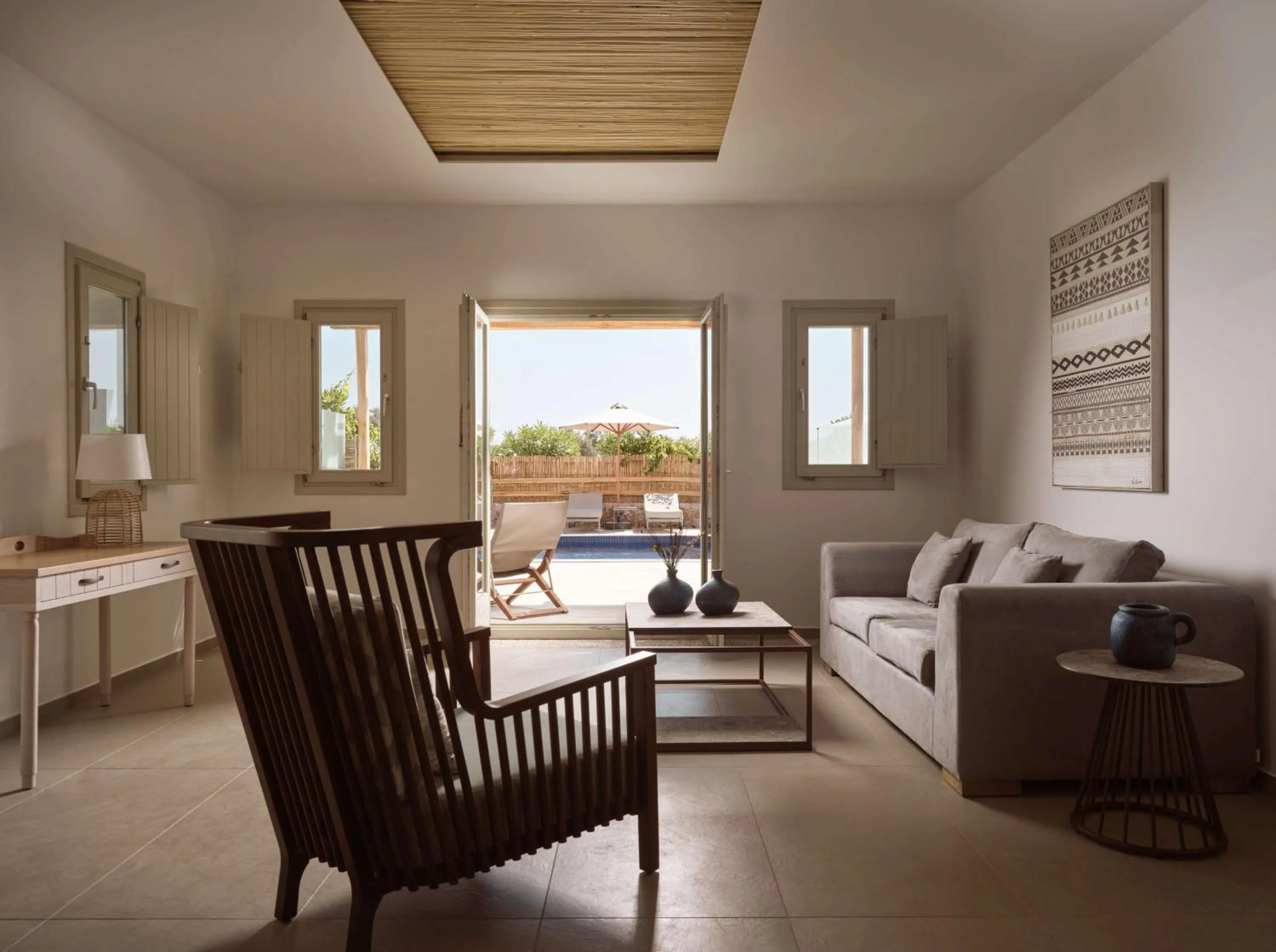 Living room in Sea Breeze Santorini Beach Resort, Curio By Hilton