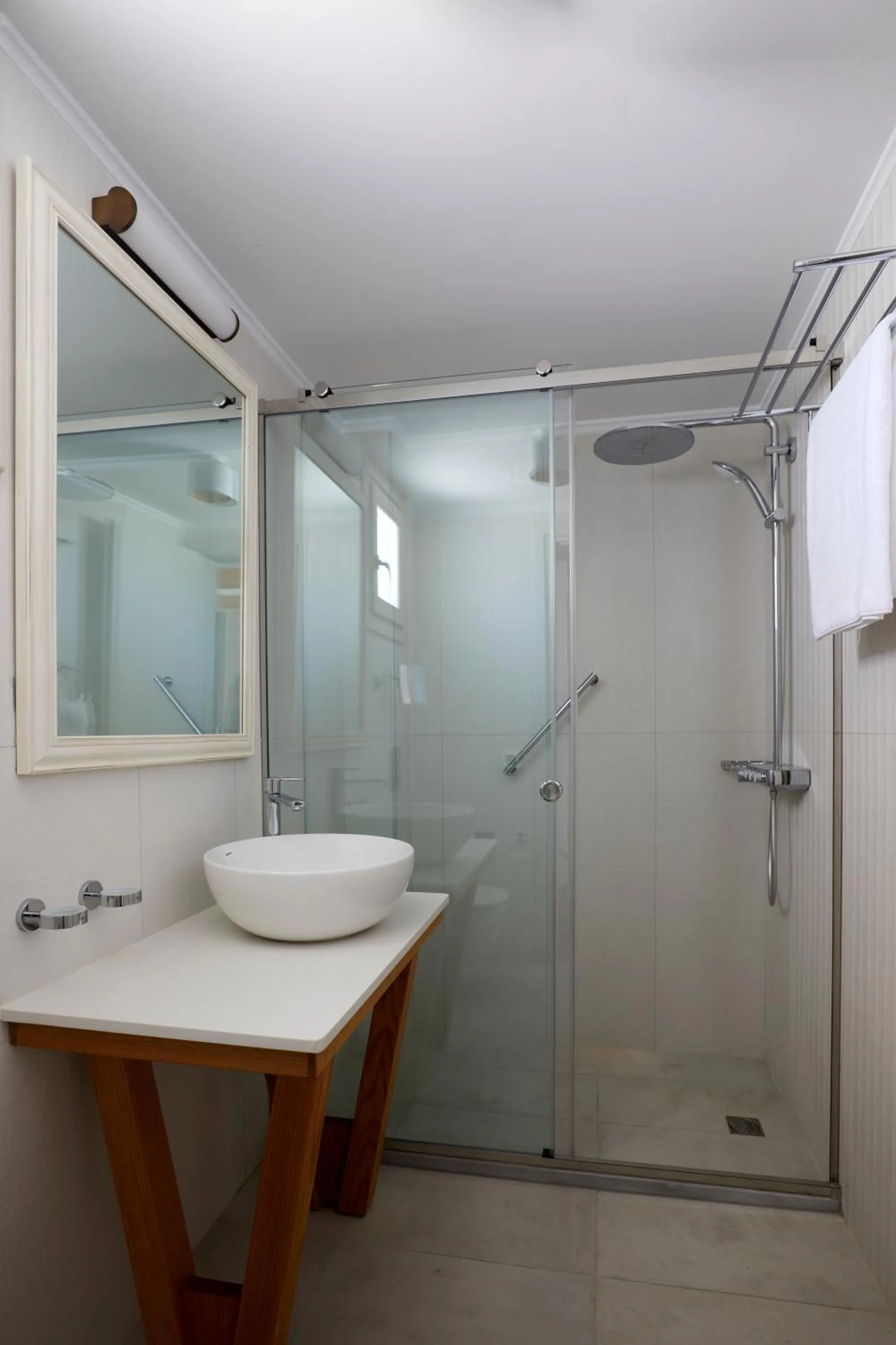 Shower in Sea Breeze Santorini Beach Resort, Curio By Hilton