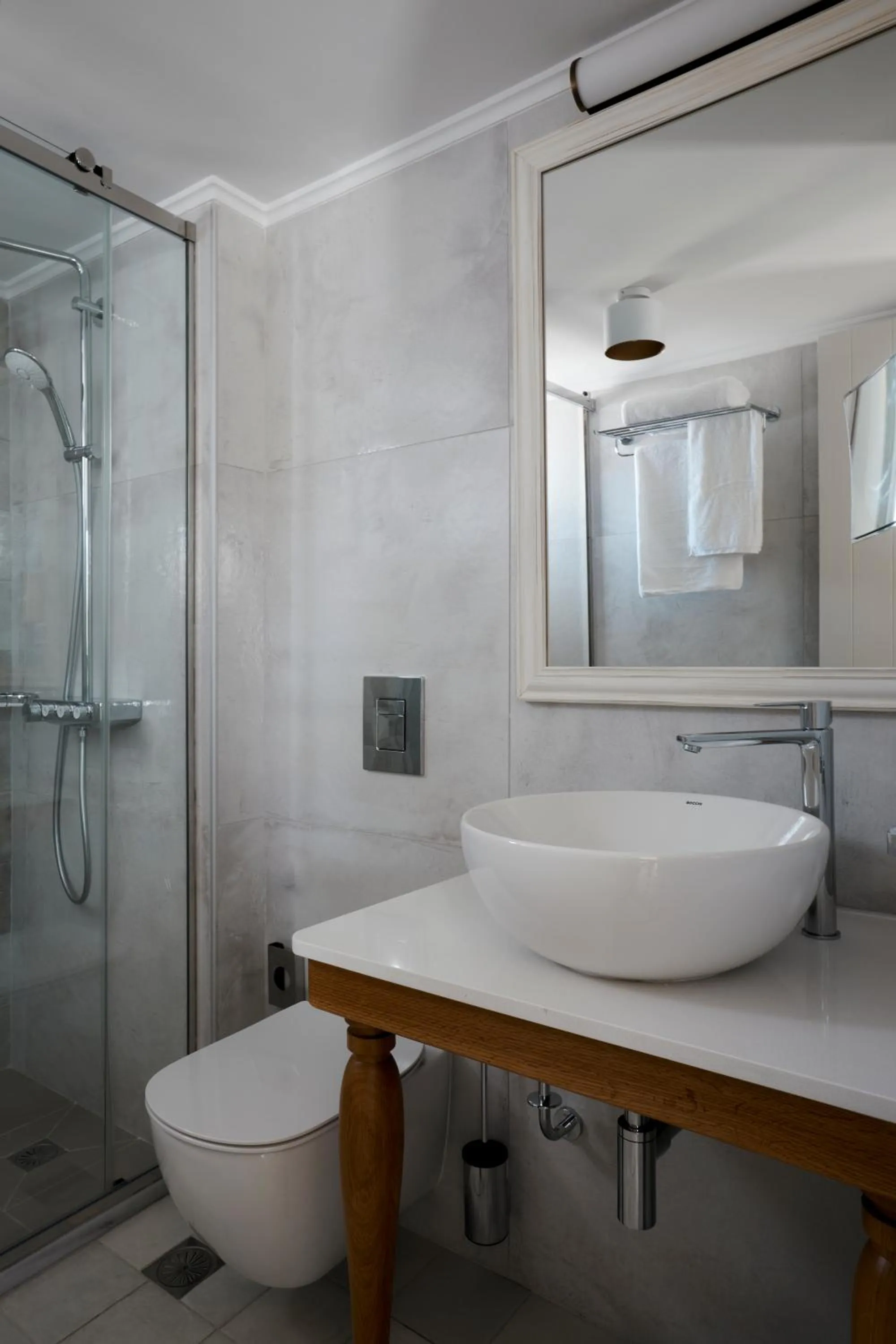 Shower in Sea Breeze Santorini Beach Resort, Curio By Hilton