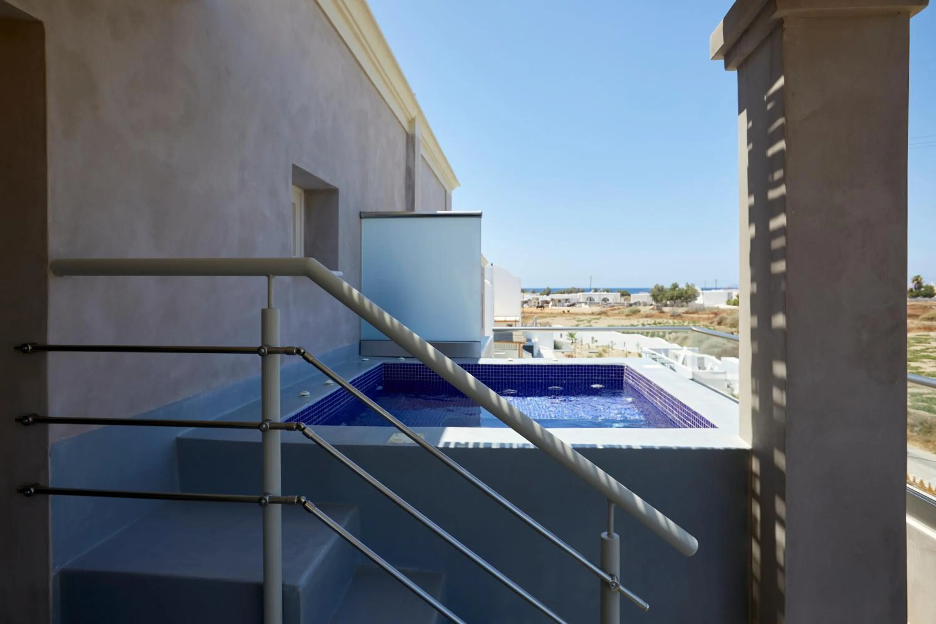 Hot Tub in Sea Breeze Santorini Beach Resort, Curio By Hilton