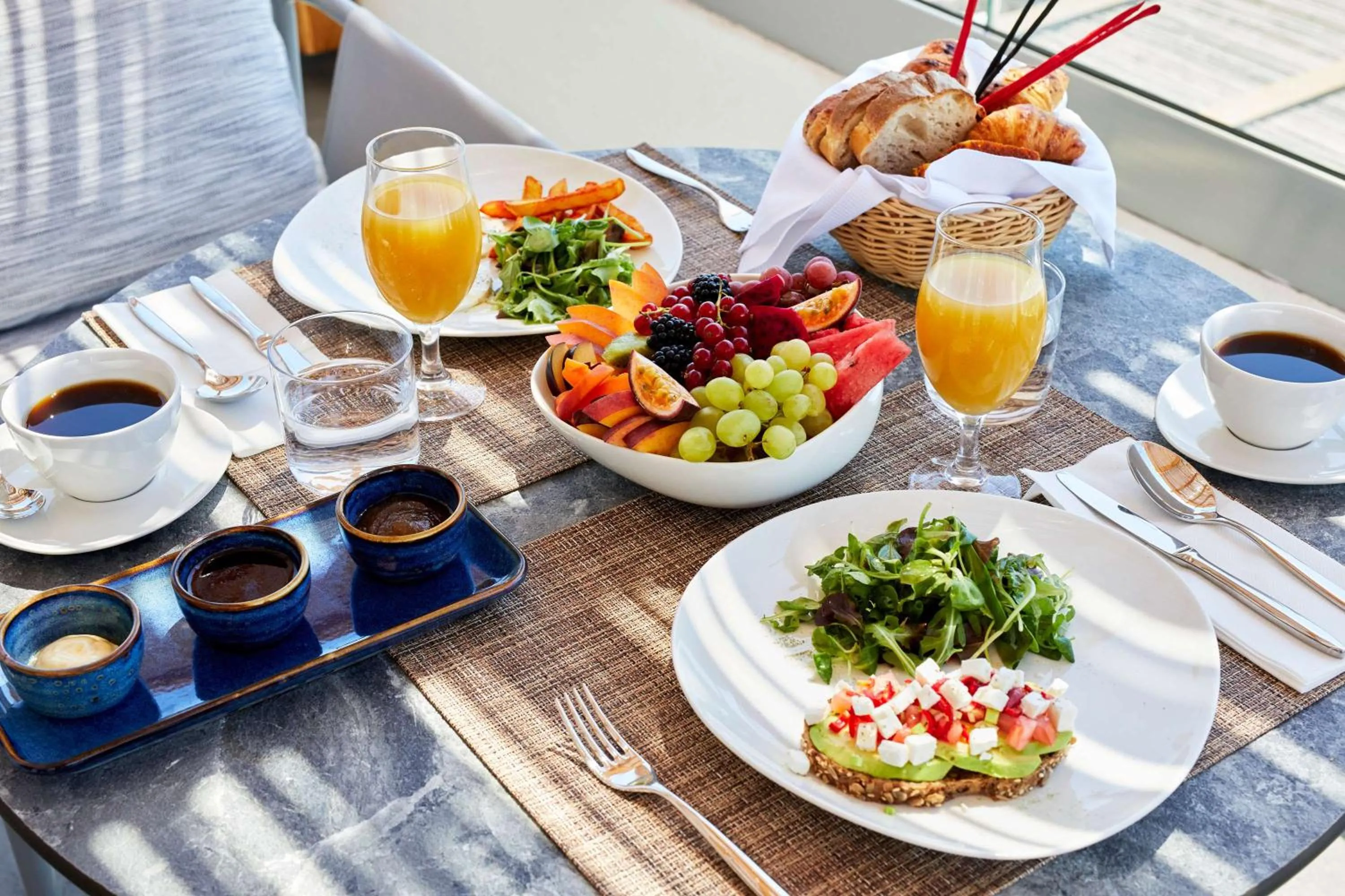 Photo of the whole room in Sea Breeze Santorini Beach Resort, Curio By Hilton