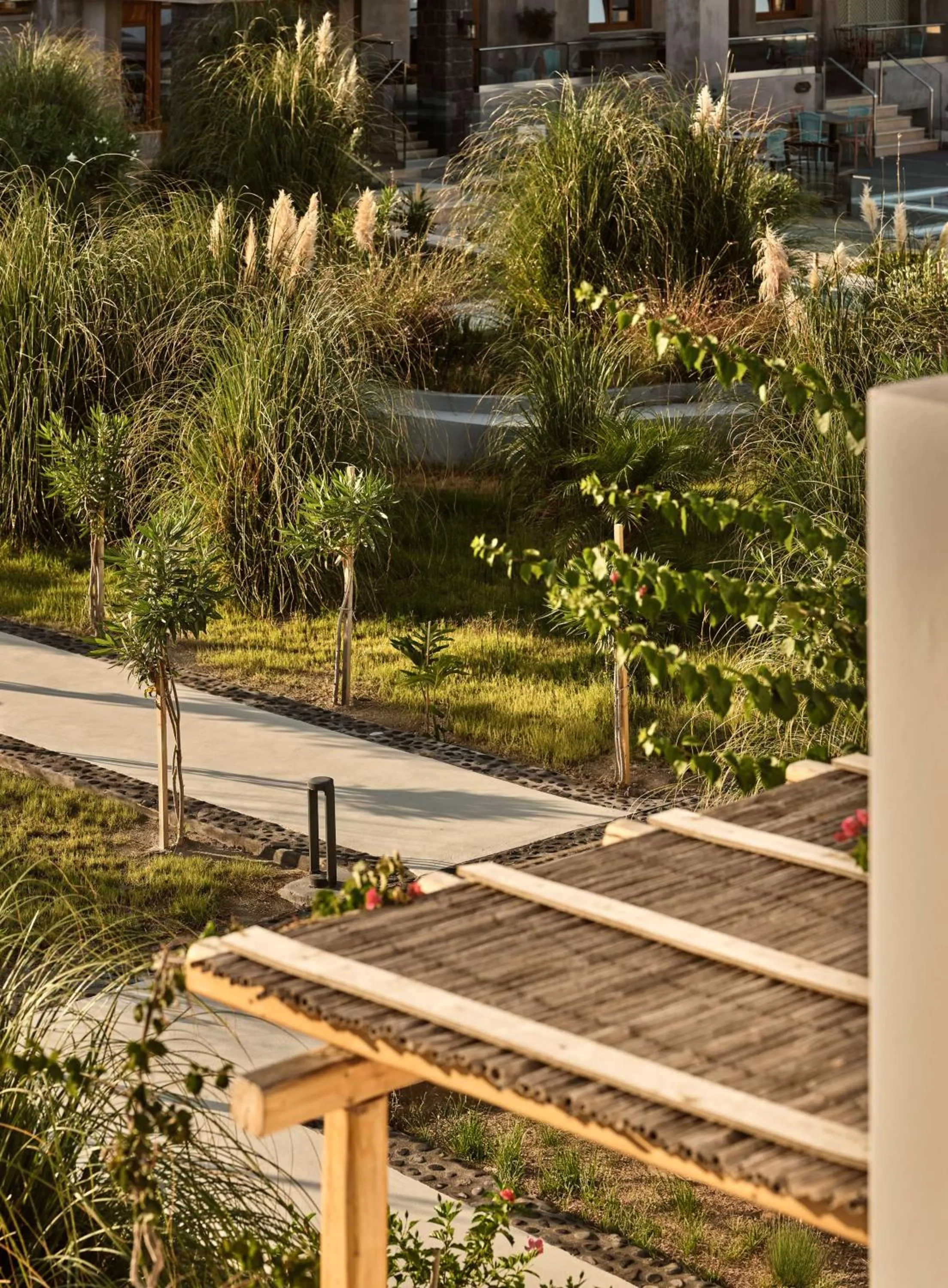 Garden in Sea Breeze Santorini Beach Resort, Curio By Hilton