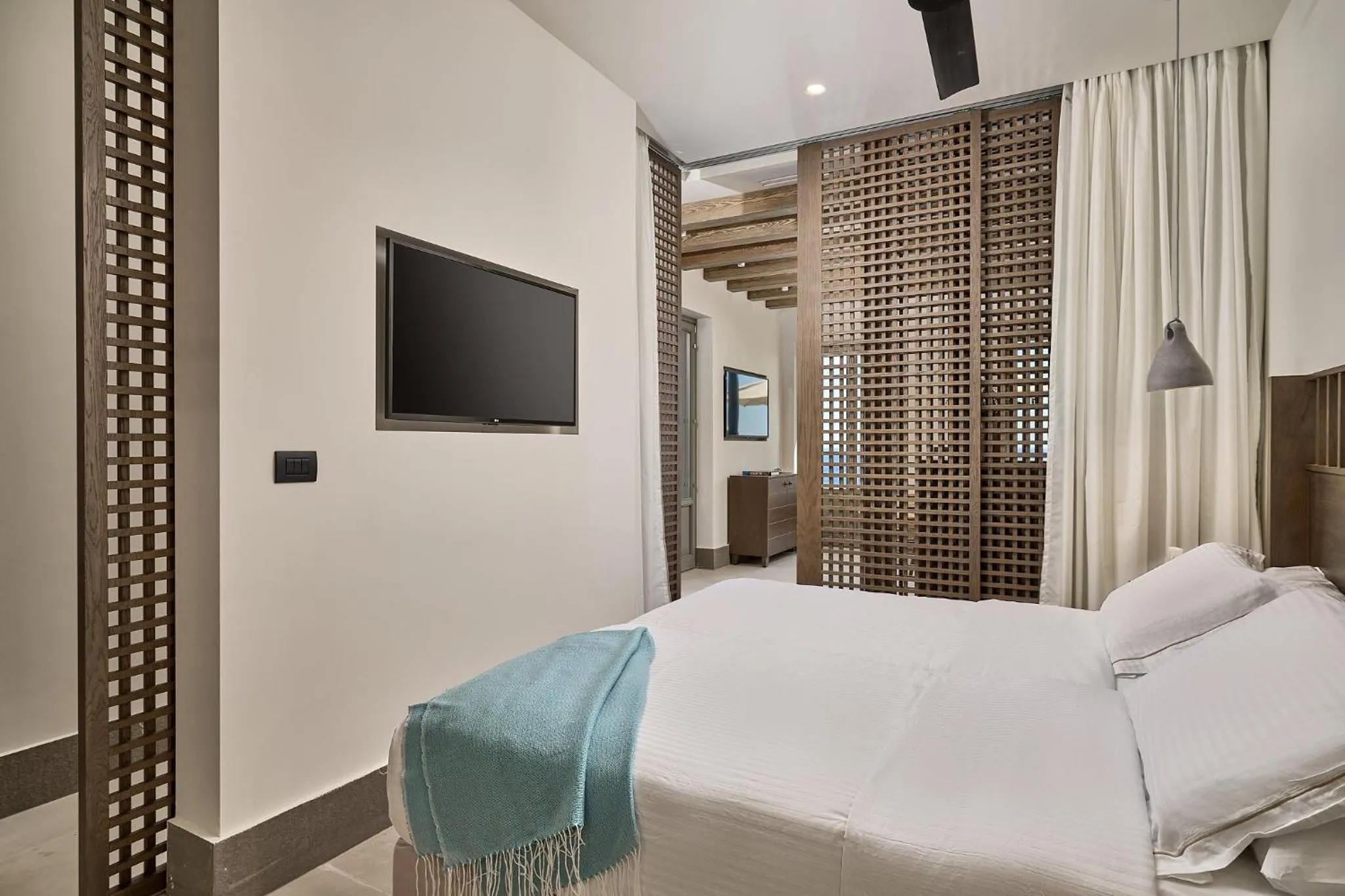 Bed in Ios Grand Pool Suites