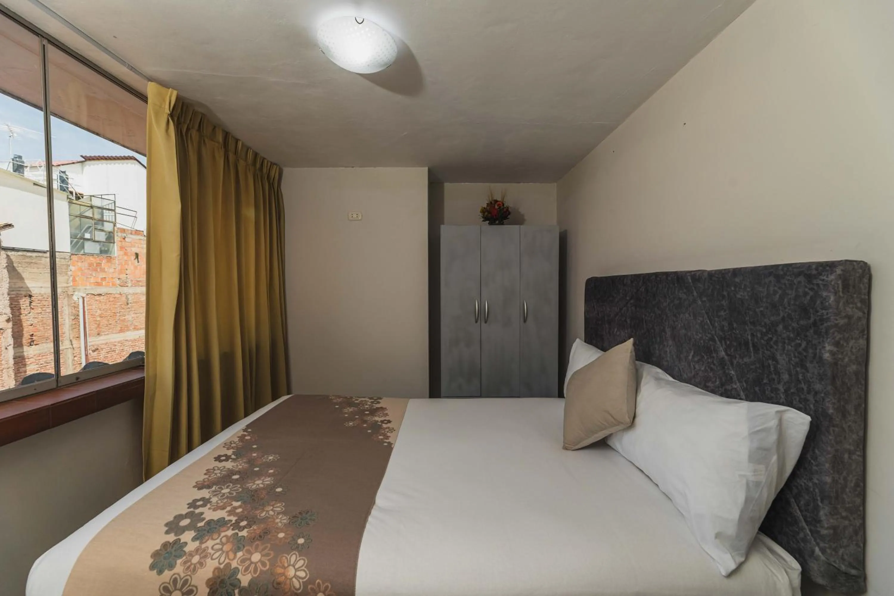 Bed in San Pedro Apartments