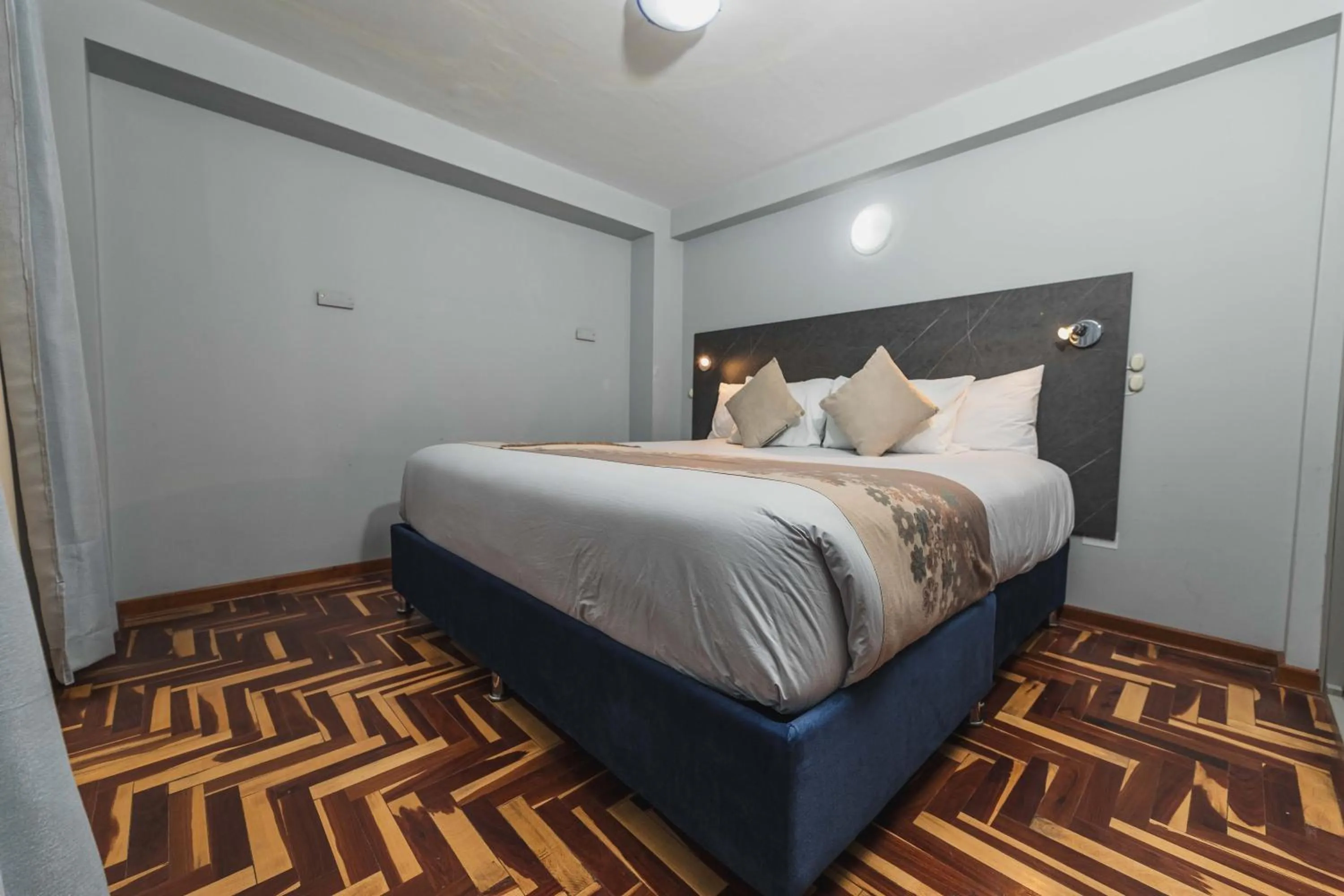 Bed in San Pedro Apartments