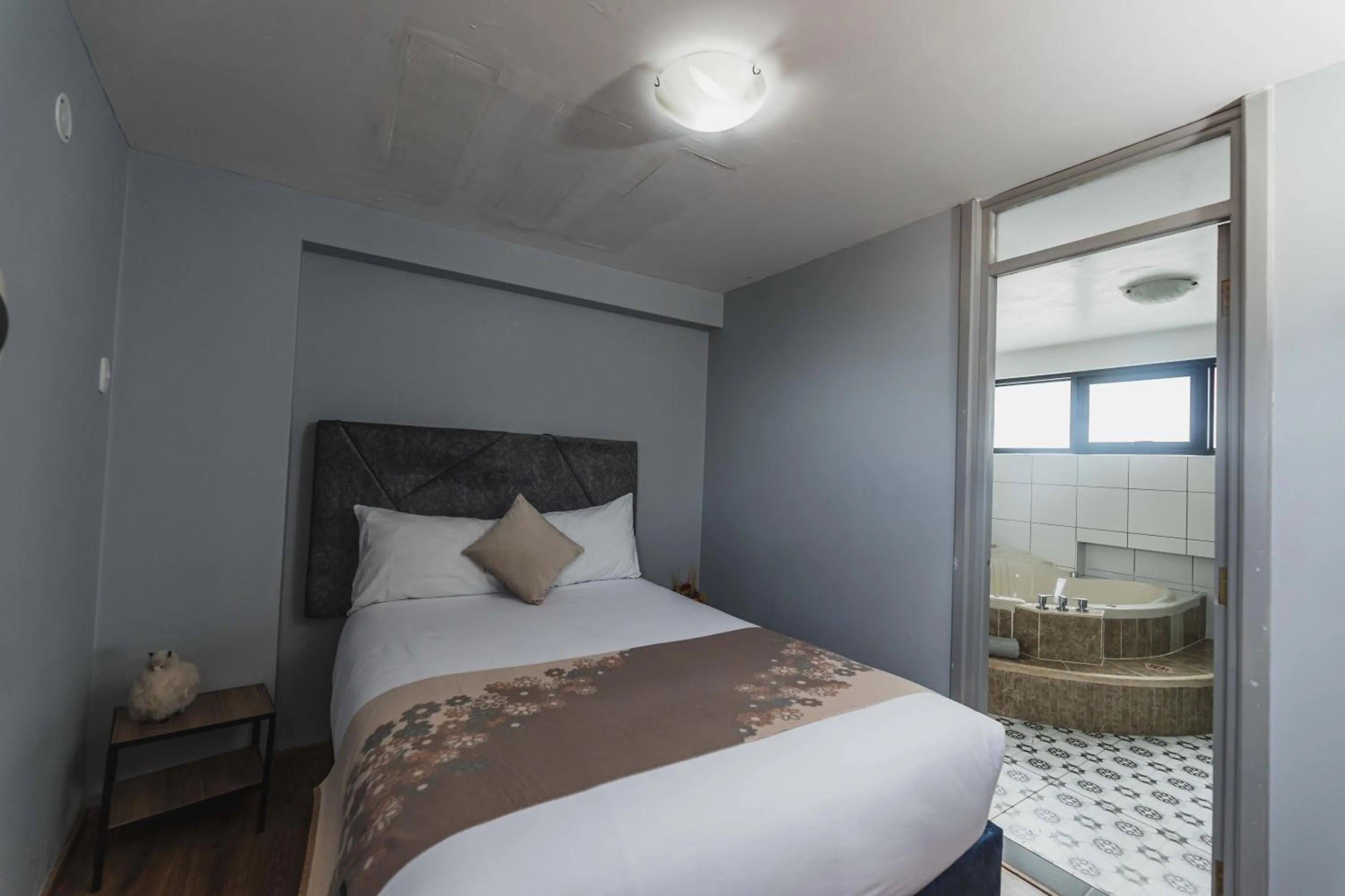 Bed in San Pedro Apartments