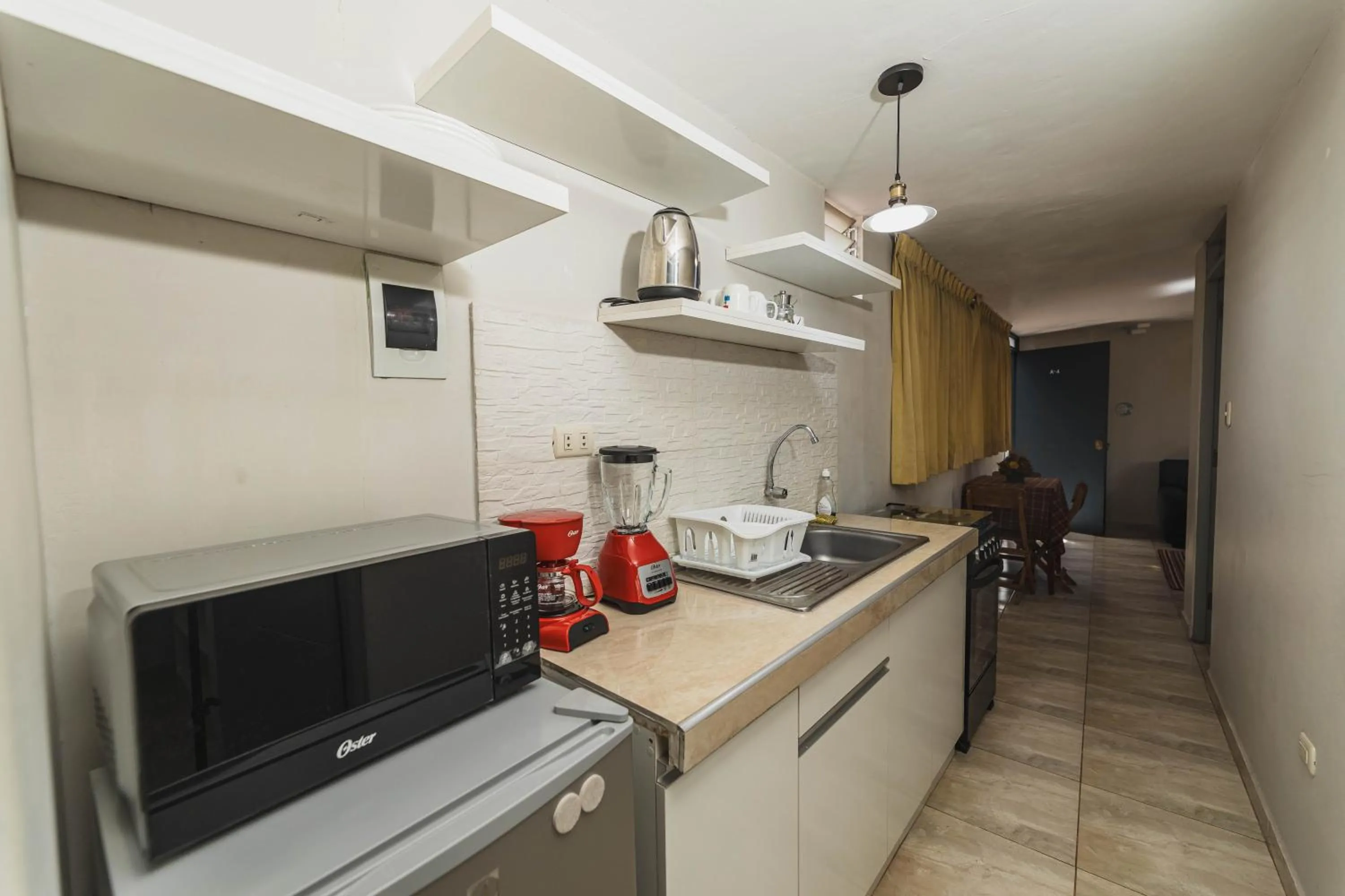 Kitchen or kitchenette in San Pedro Apartments