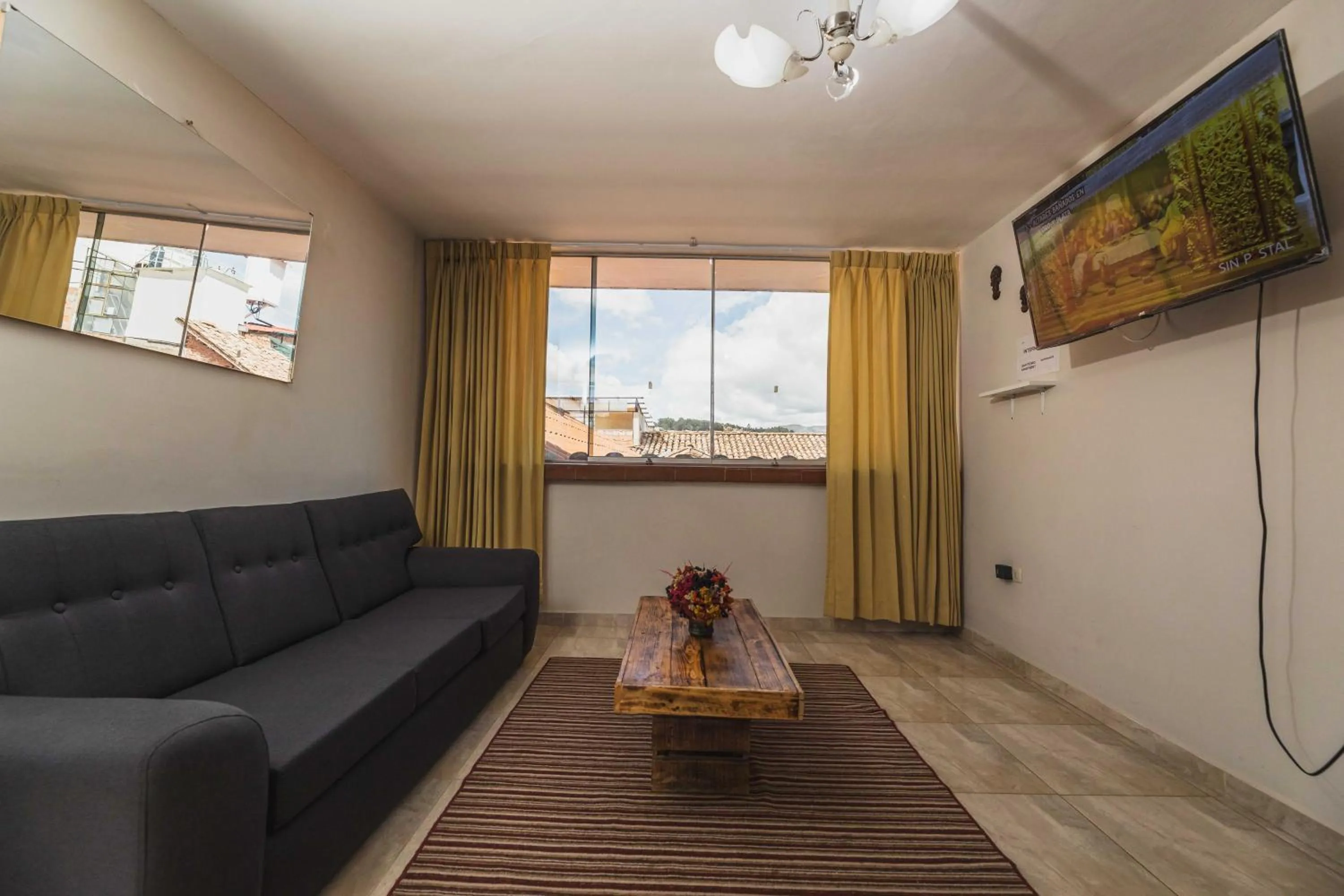 Communal lounge/ TV room in San Pedro Apartments