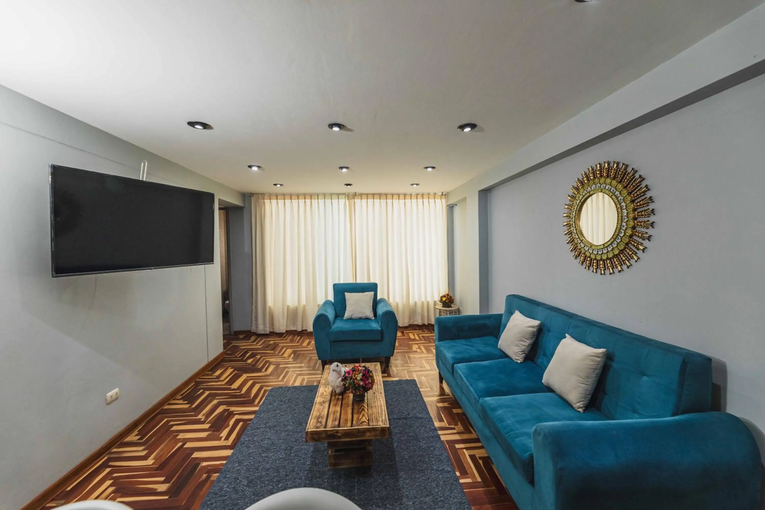 Communal lounge/ TV room in San Pedro Apartments
