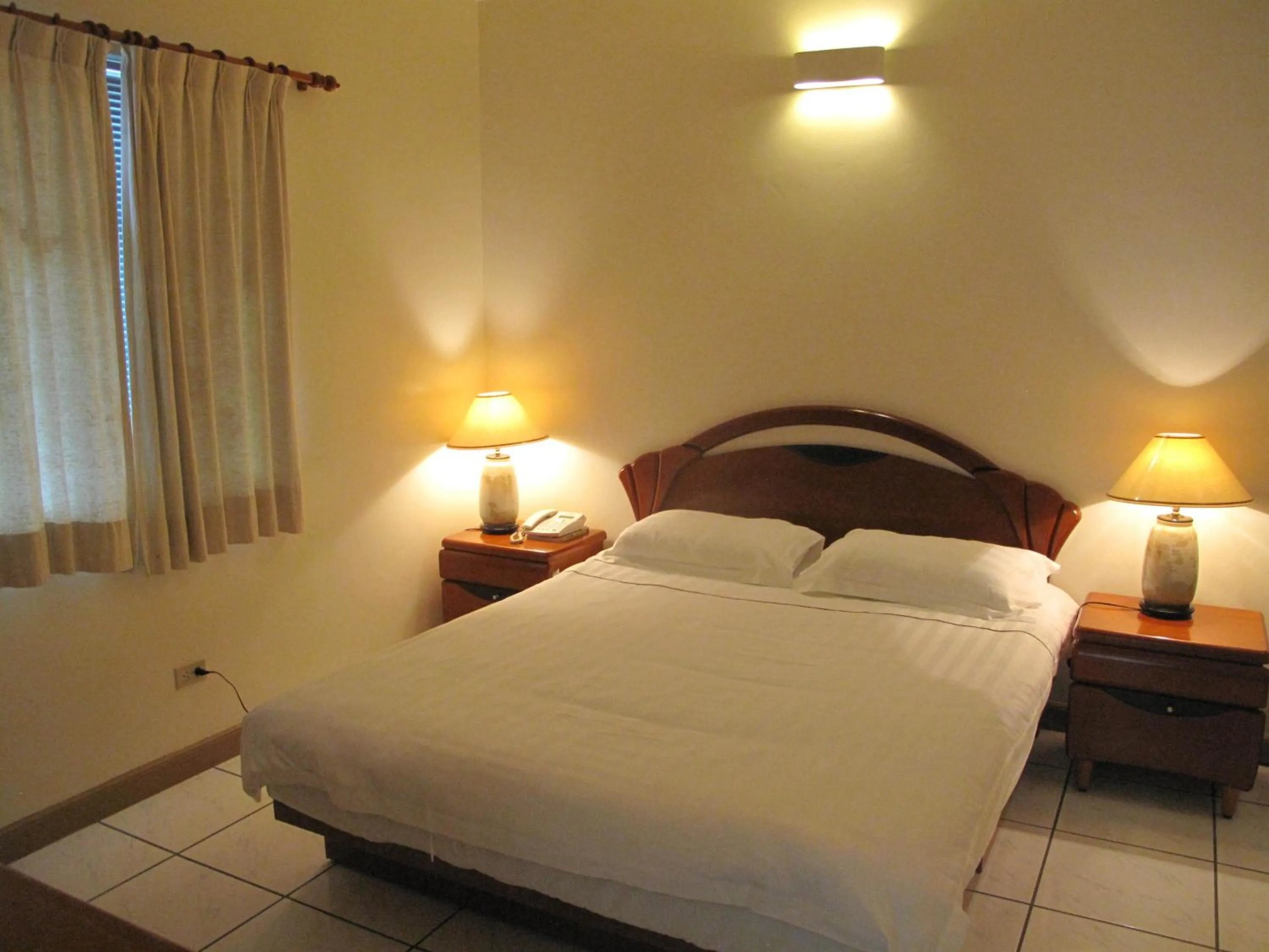 Bedroom in Capital Hotel