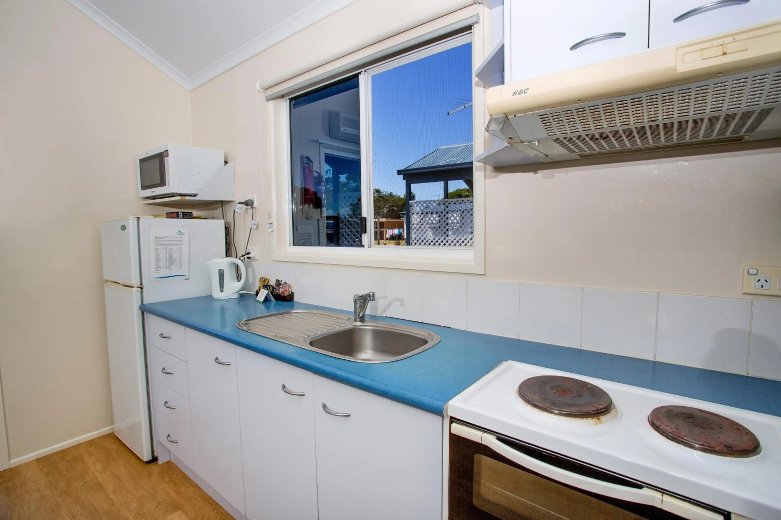 Kitchen or kitchenette in Reflections Evans Head - Holiday Park