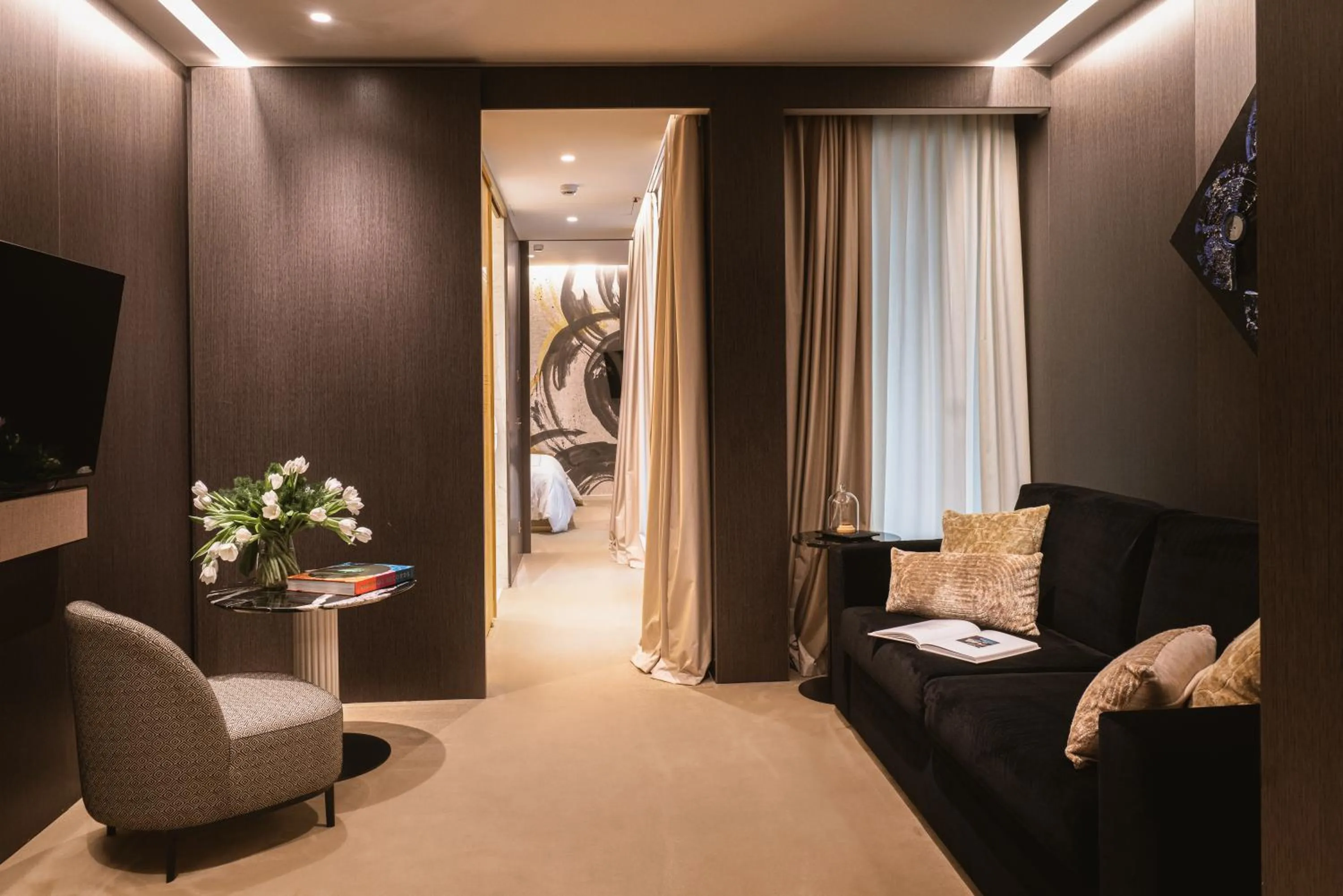 Communal lounge/ TV room in The First Musica - Preferred Hotels & Resorts