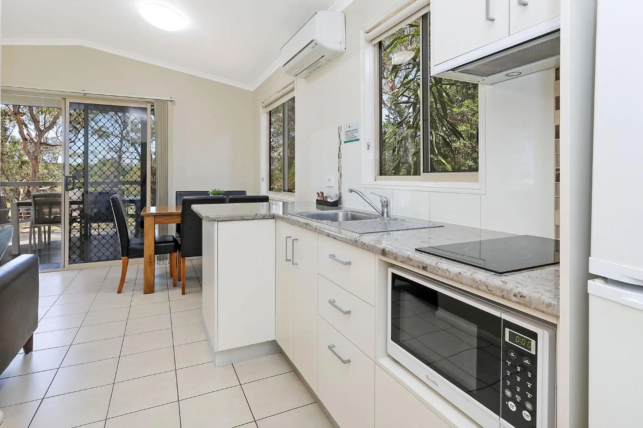 Kitchen or kitchenette in Reflections Moonee Beach - Holiday Park