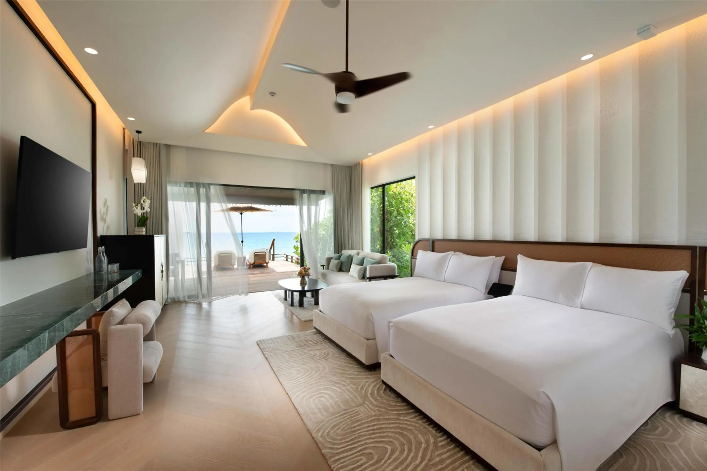 Bed in Hilton Maldives Amingiri Resort & Spa