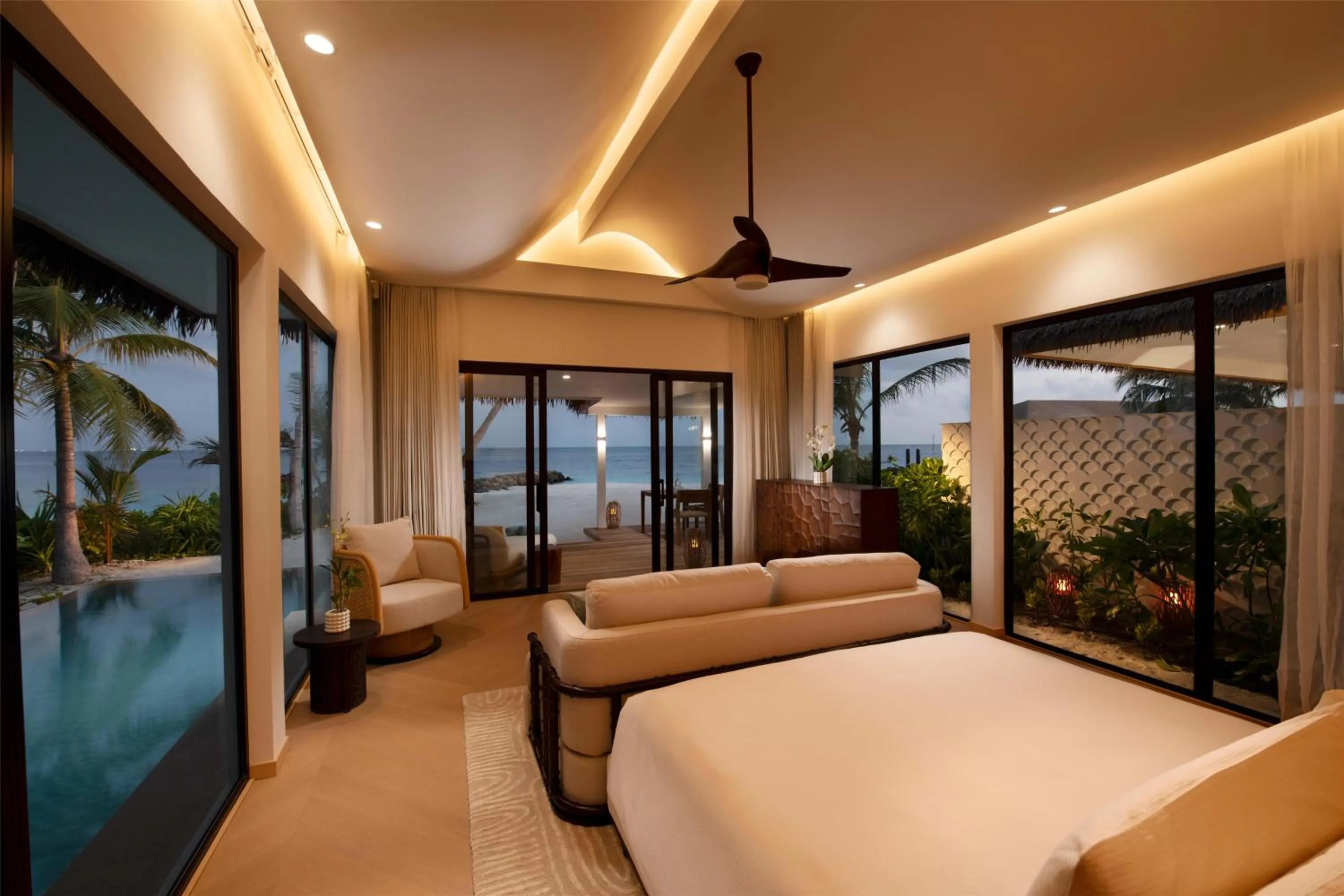 Bed in Hilton Maldives Amingiri Resort & Spa