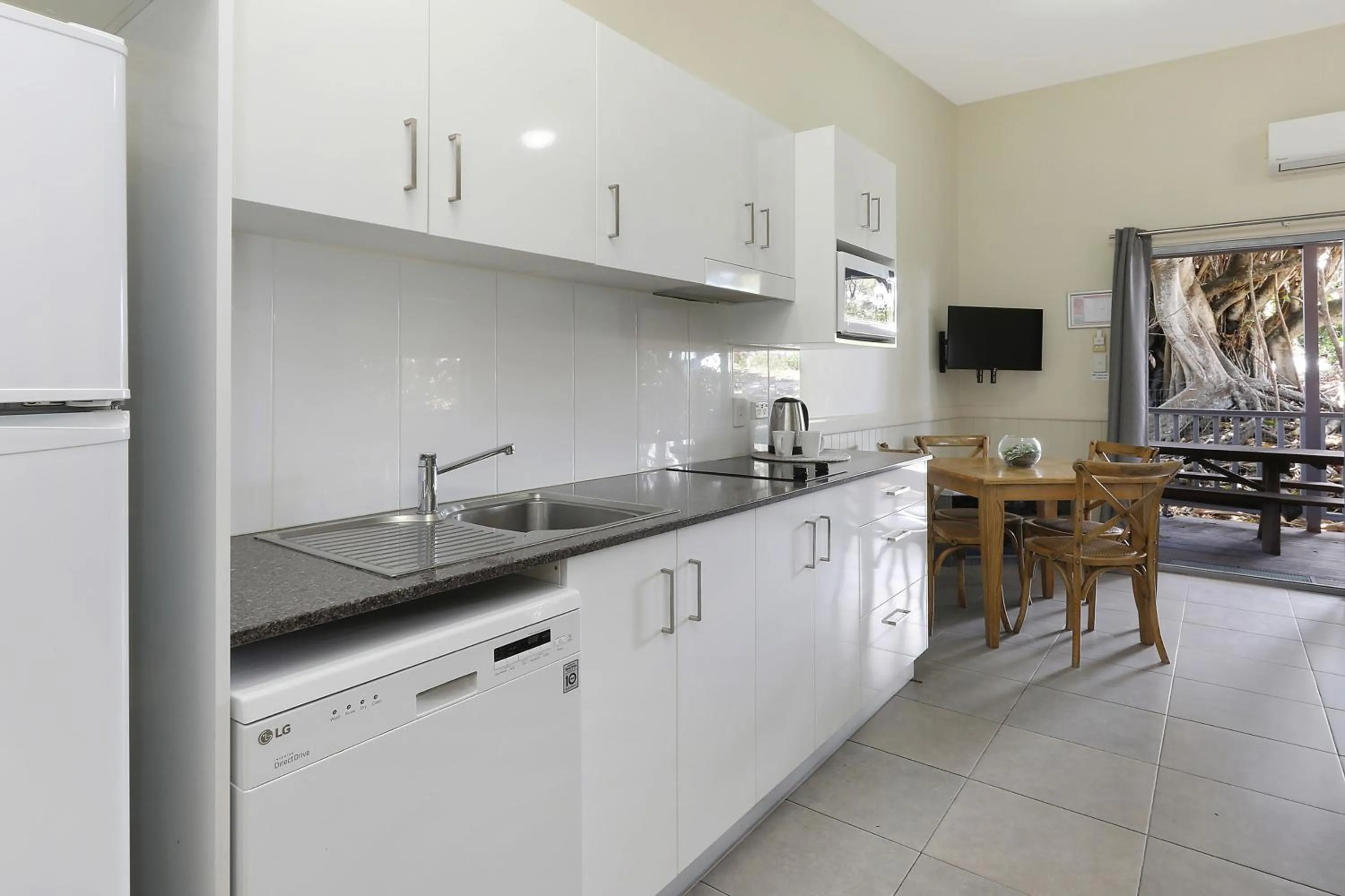 Kitchen or kitchenette in Reflections Byron Bay - Holiday Park