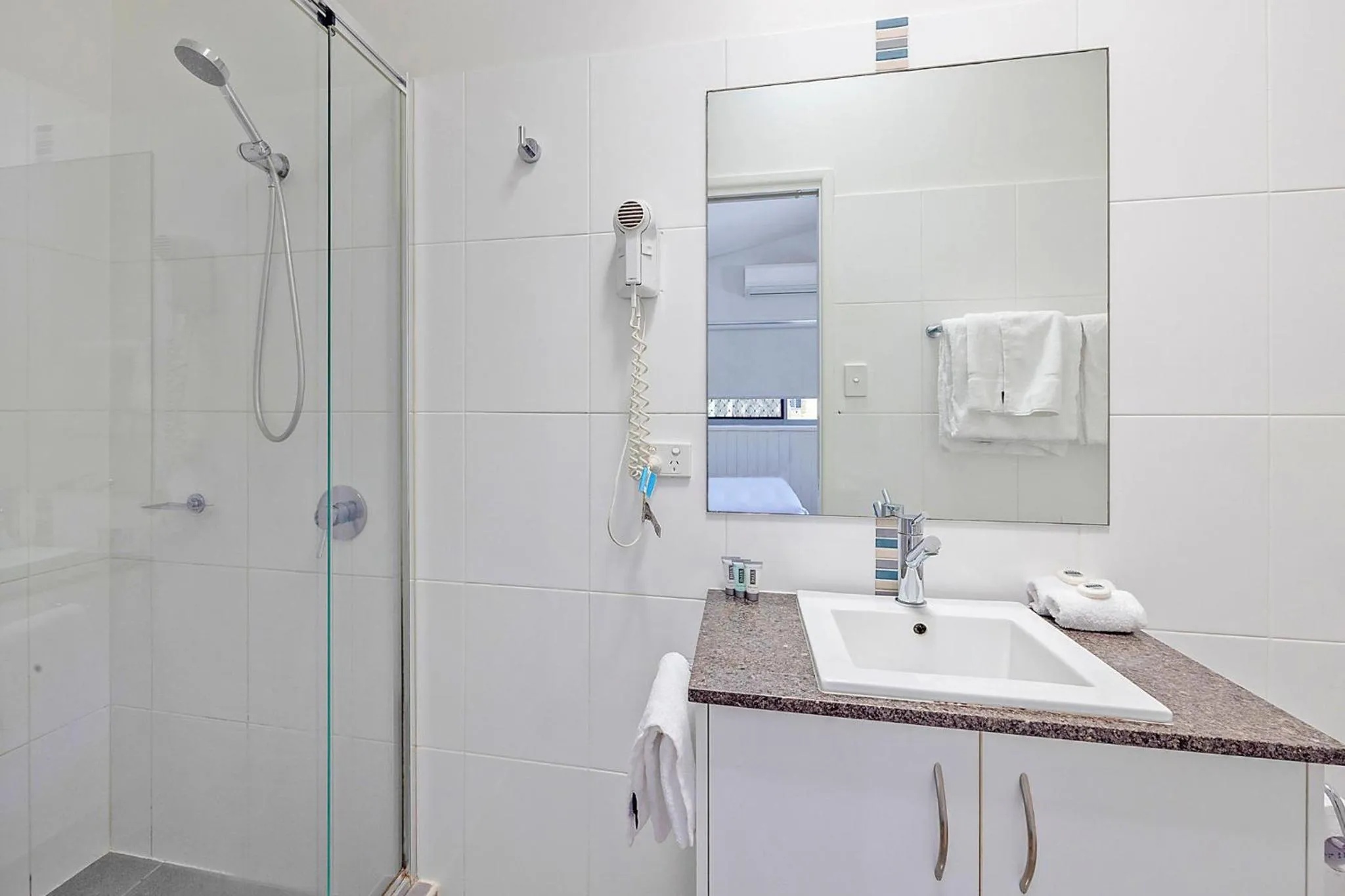 Bathroom in Reflections Byron Bay - Holiday Park