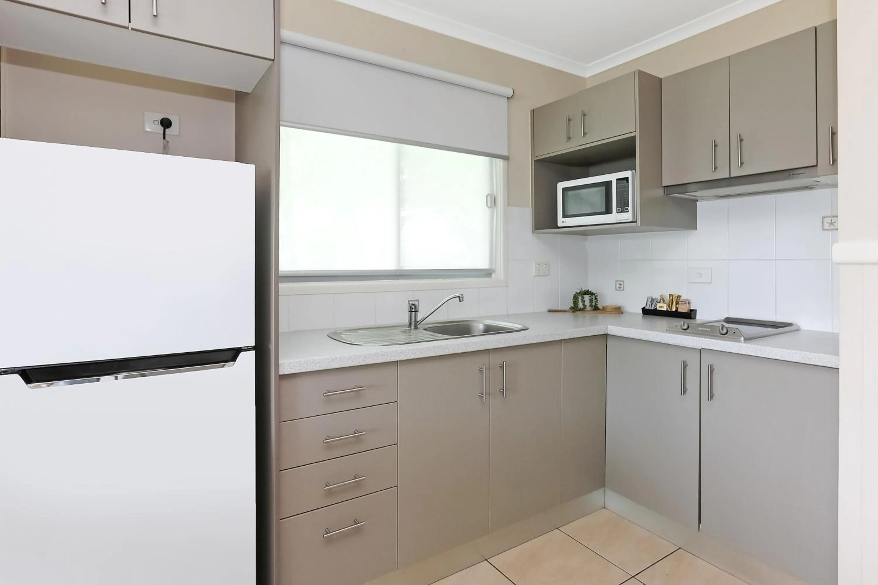 Kitchen or kitchenette in Reflections Shaws Bay - Holiday Park