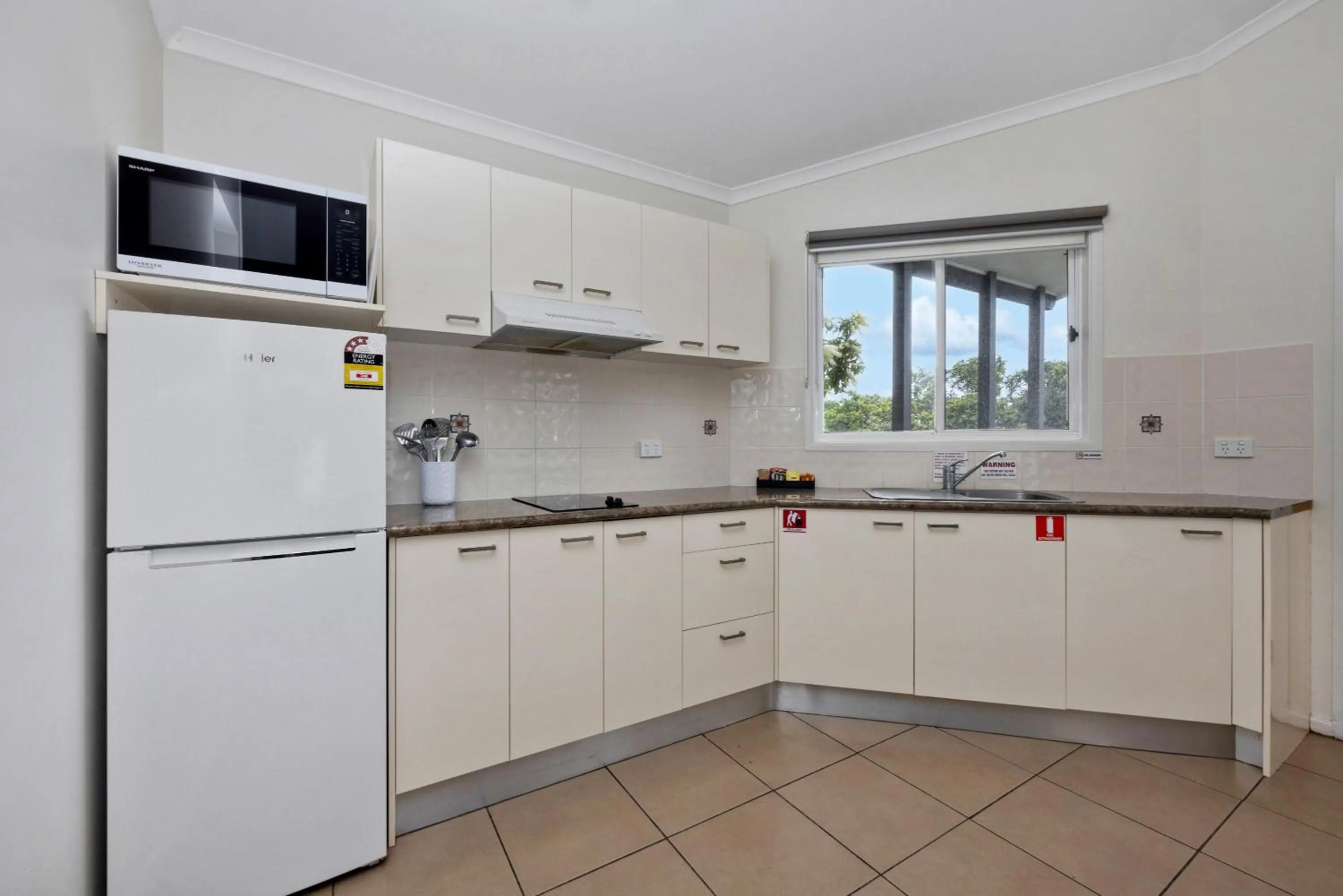 kitchen in Reflections Urunga - Holiday Park