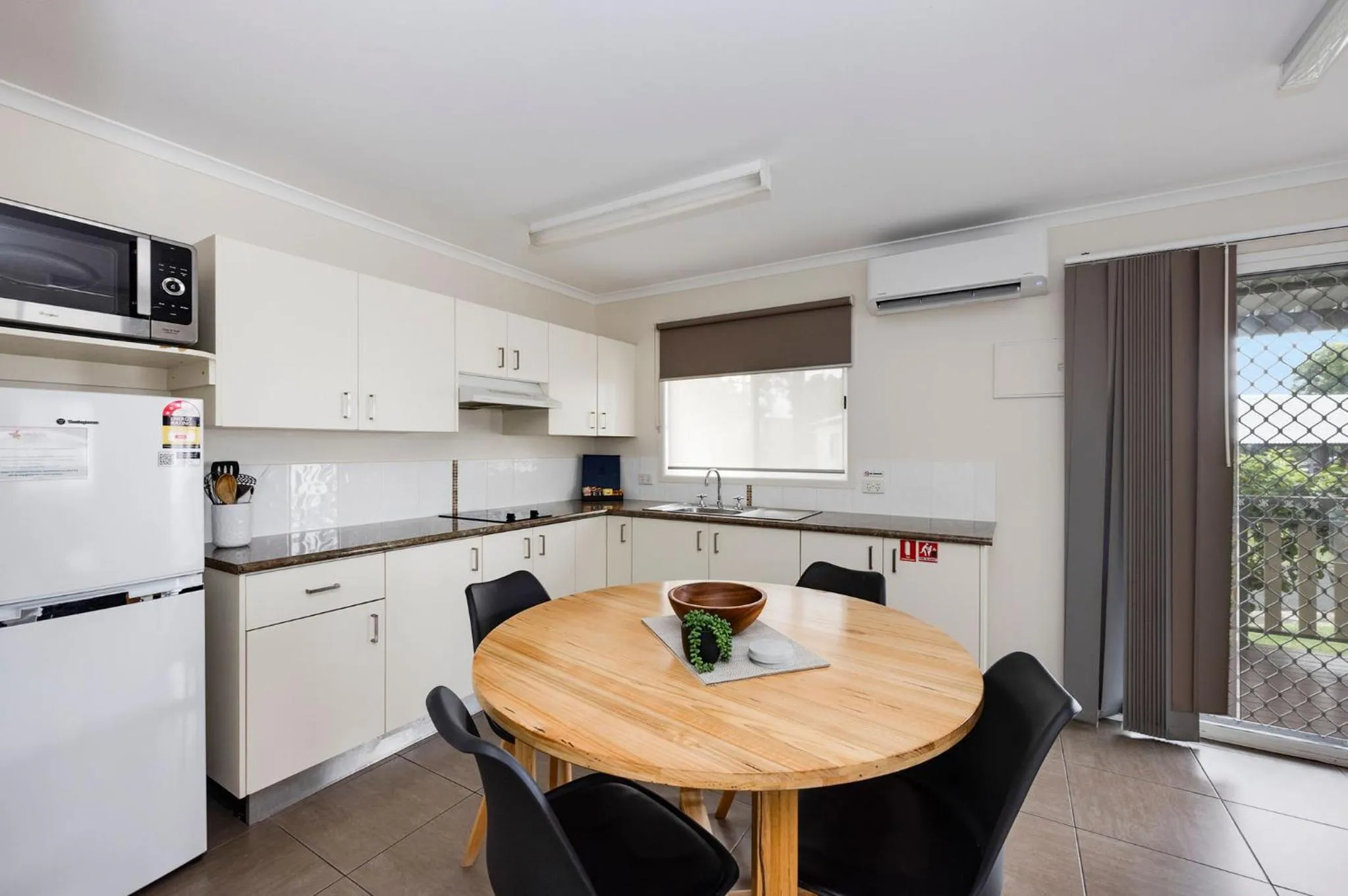 Dining area in Reflections Urunga - Holiday Park
