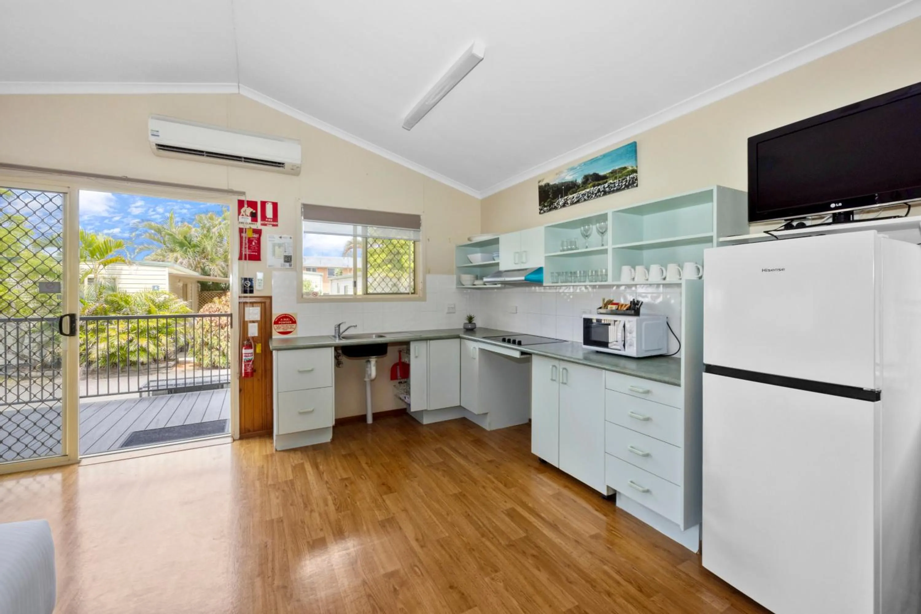 Kitchen or kitchenette in Reflections Tuncurry - Holiday Park