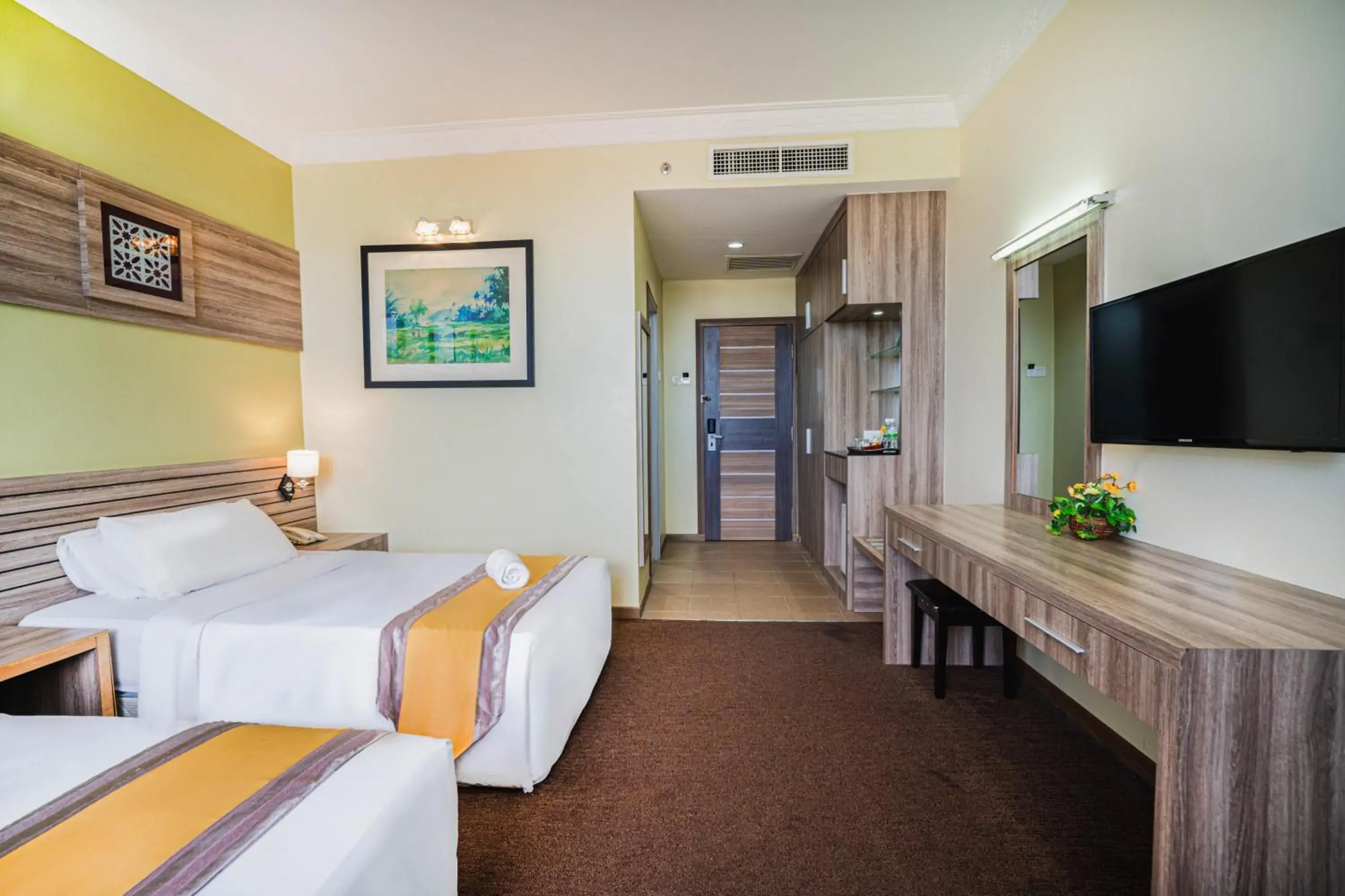 Bed in HIG Hotel & Convention Bed in HIG Hotel & Convention