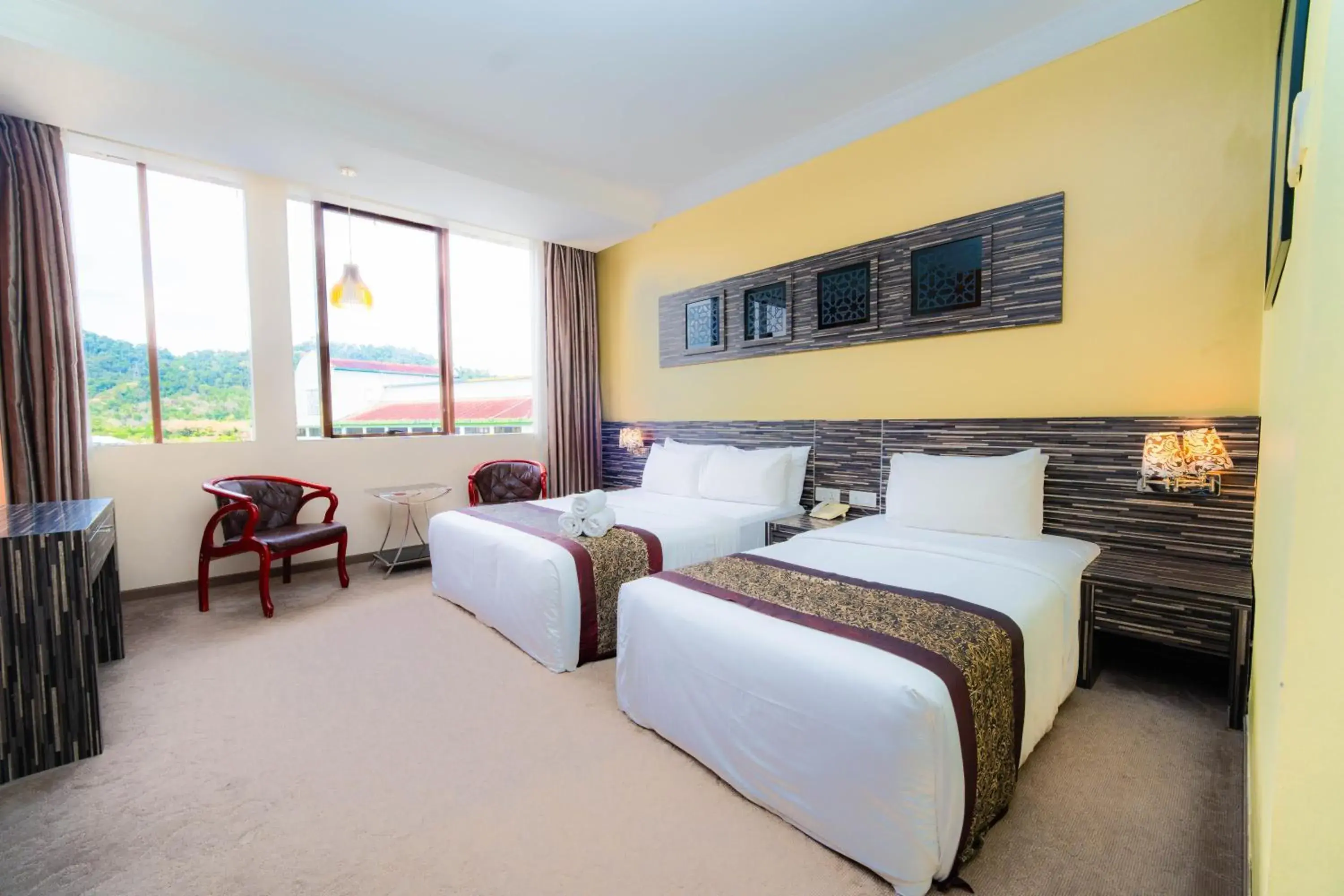 Bed in HIG Hotel & Convention Bed in HIG Hotel & Convention