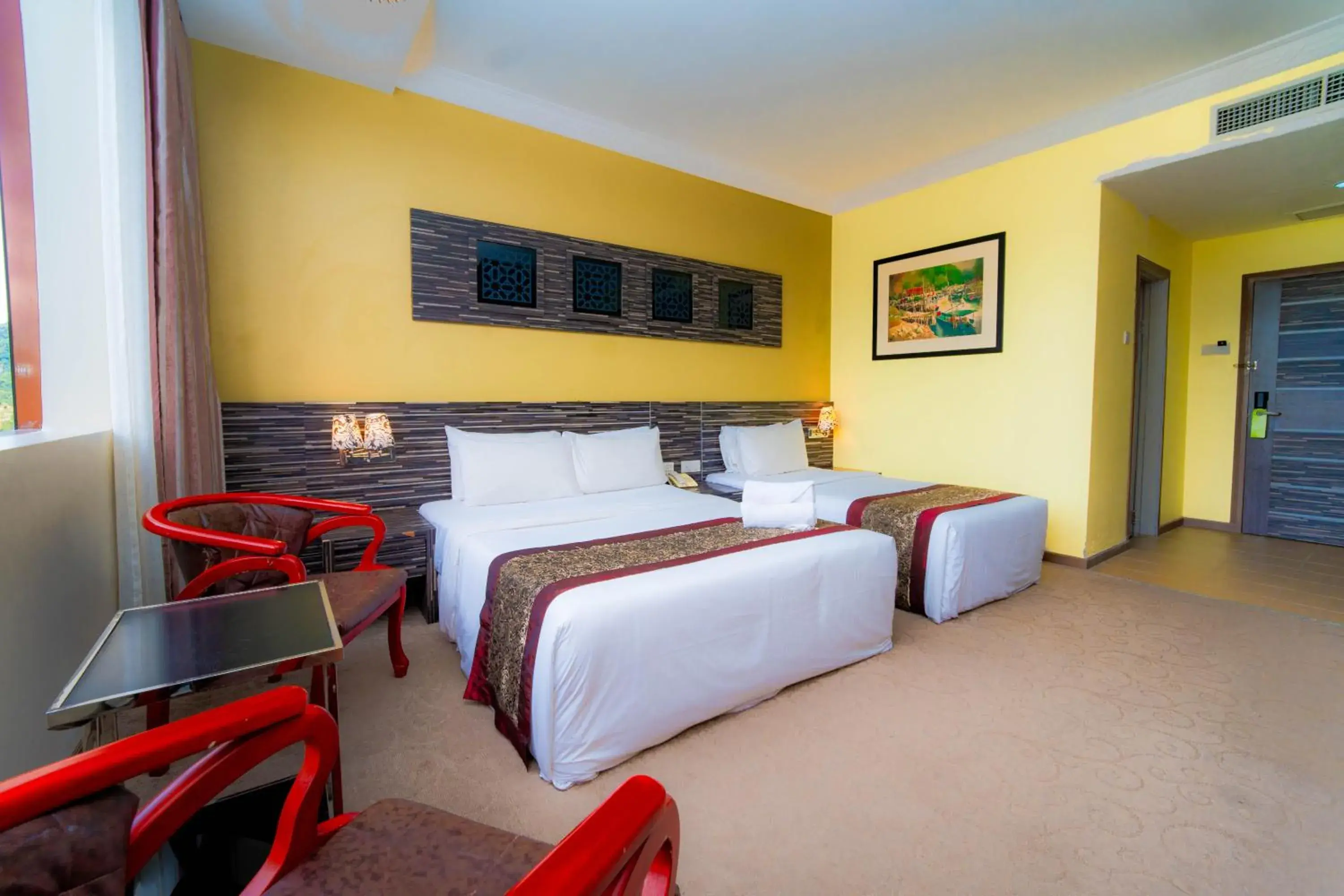 Bed in HIG Hotel & Convention Bed in HIG Hotel & Convention