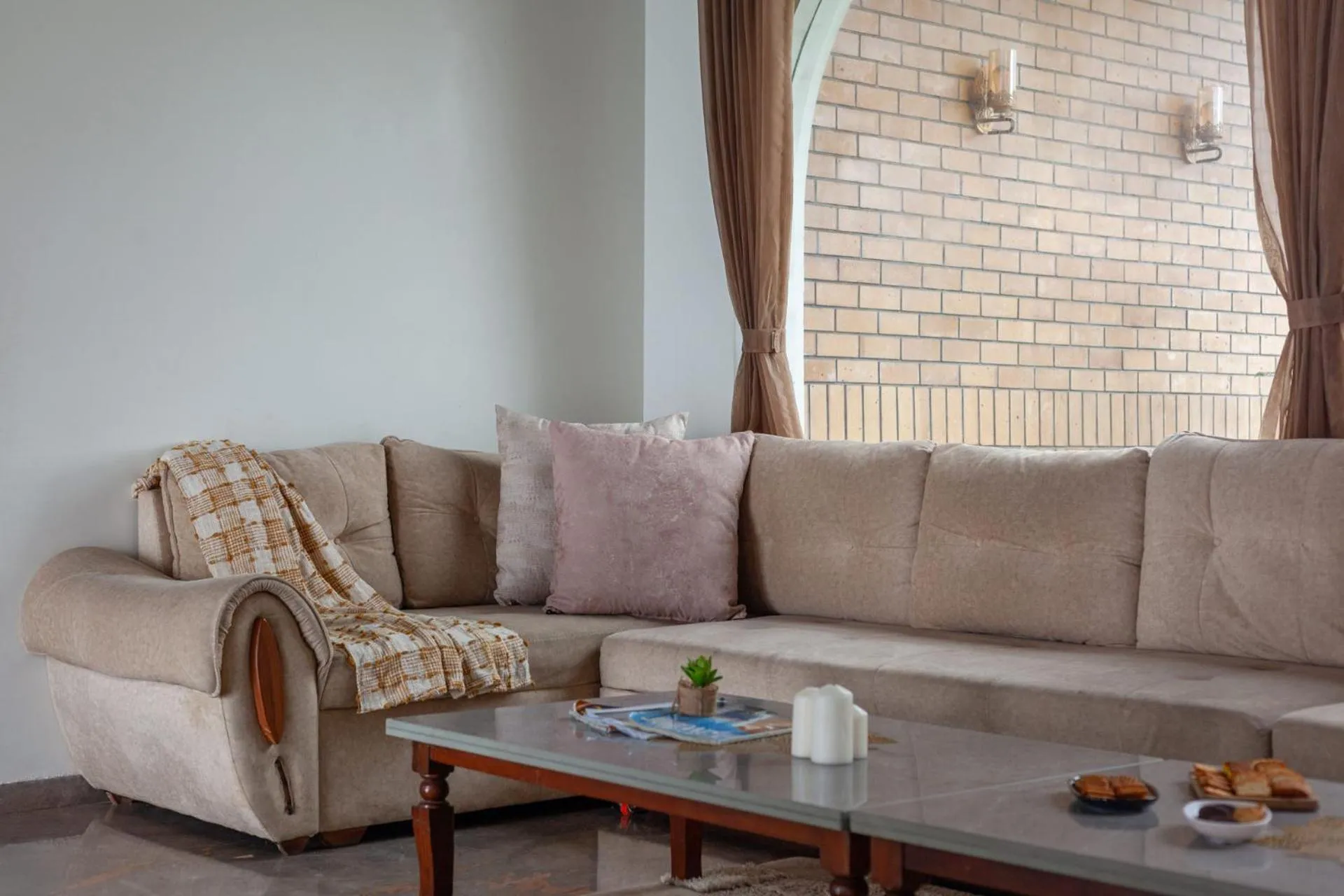 Living room in Lake Arches by StayVista - Lakeside villa with Infinity pool, Gazebo & Modern Greek interiors