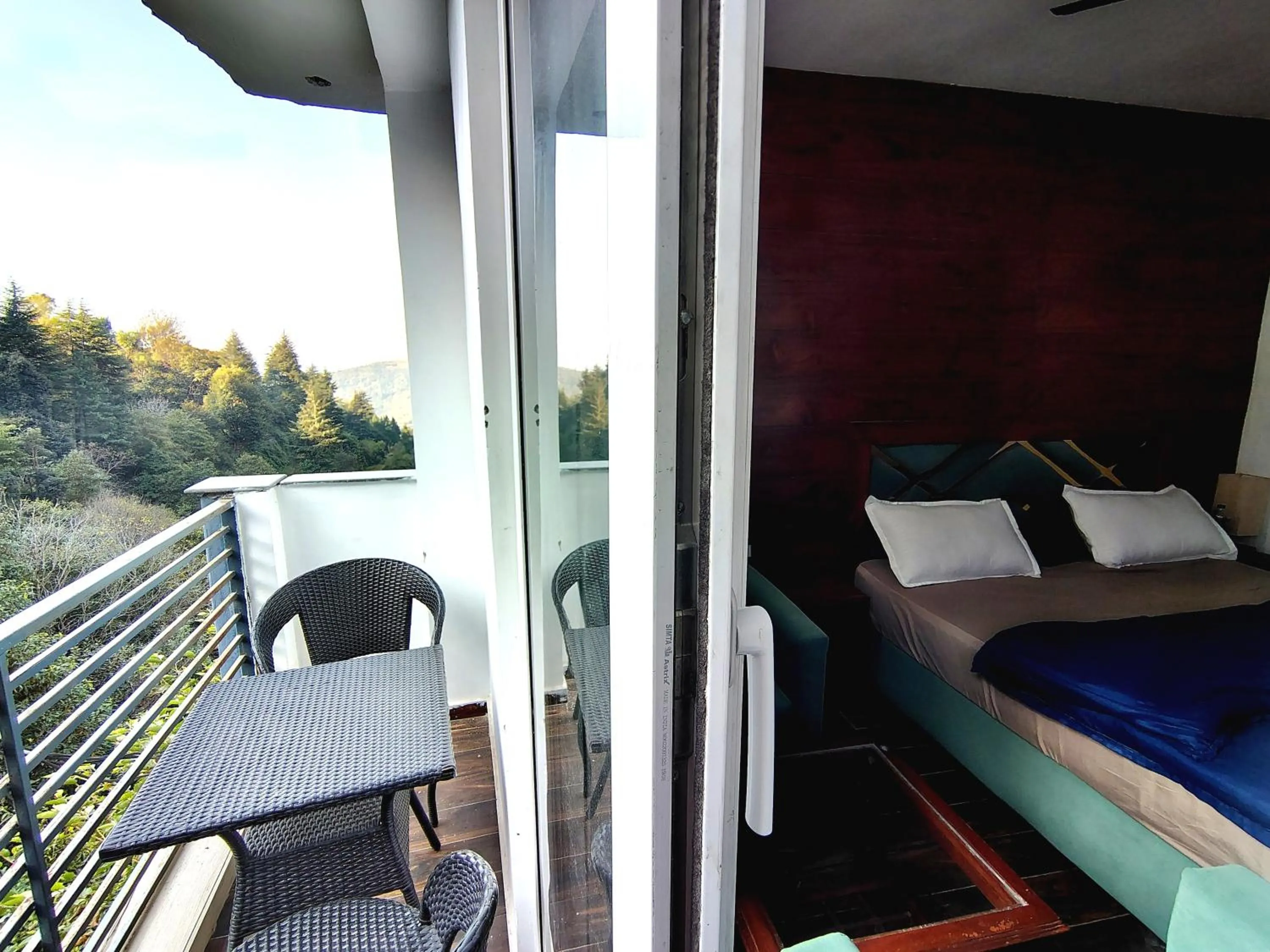 Bed in Chakrata Inn Resort