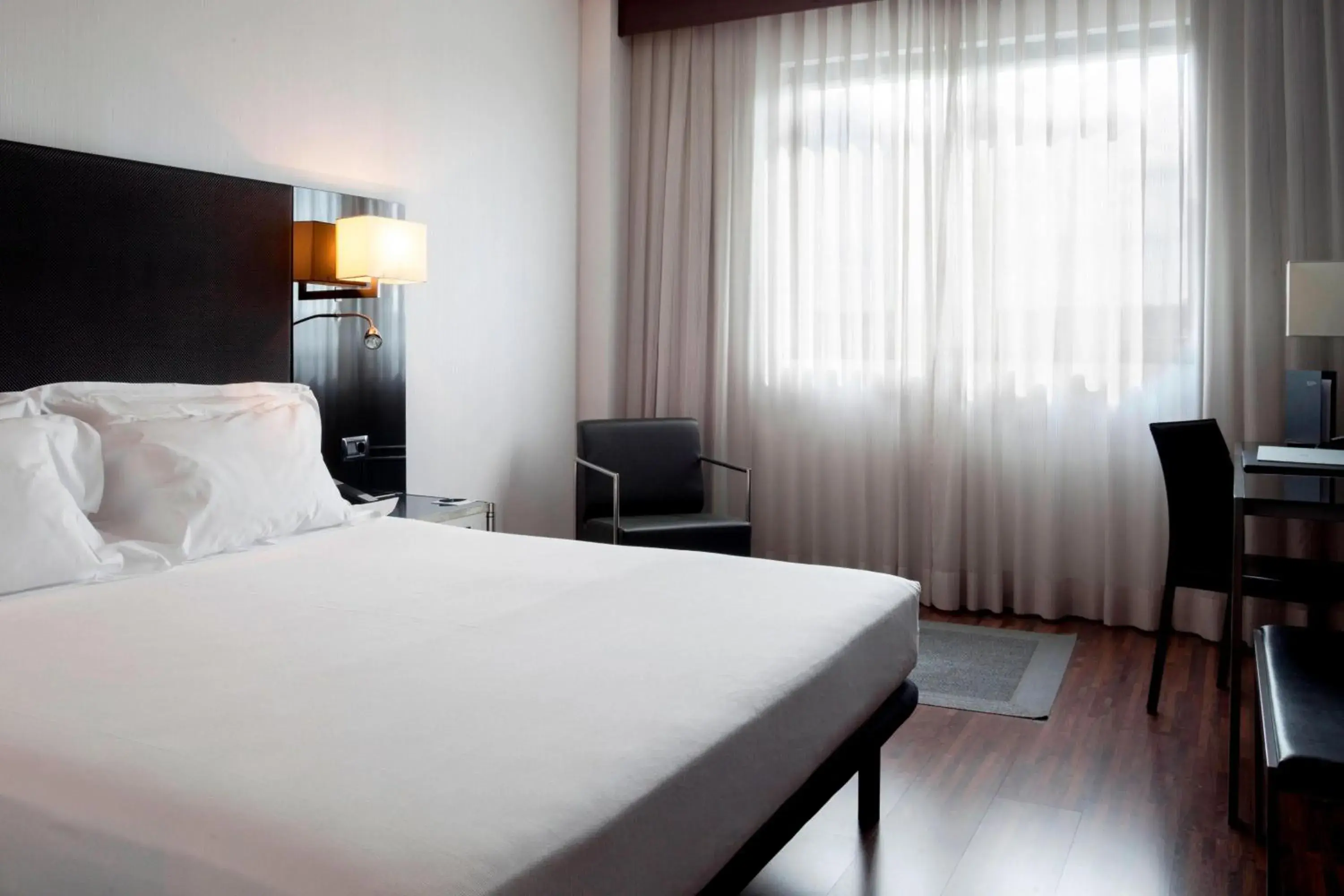 Photo of the whole room, Bed in AC Hotel Padova by Marriott