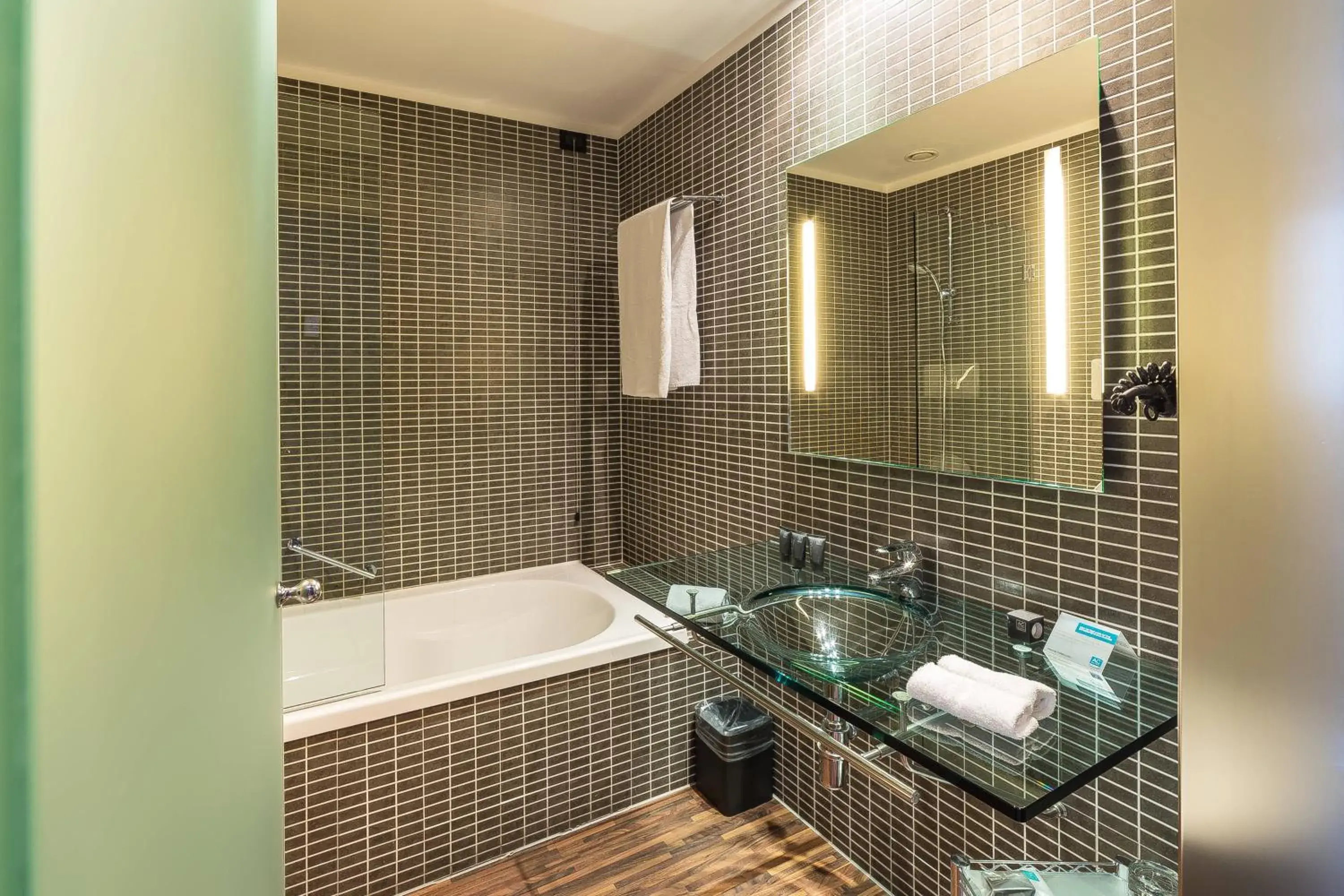 Bathroom in AC Hotel Padova by Marriott